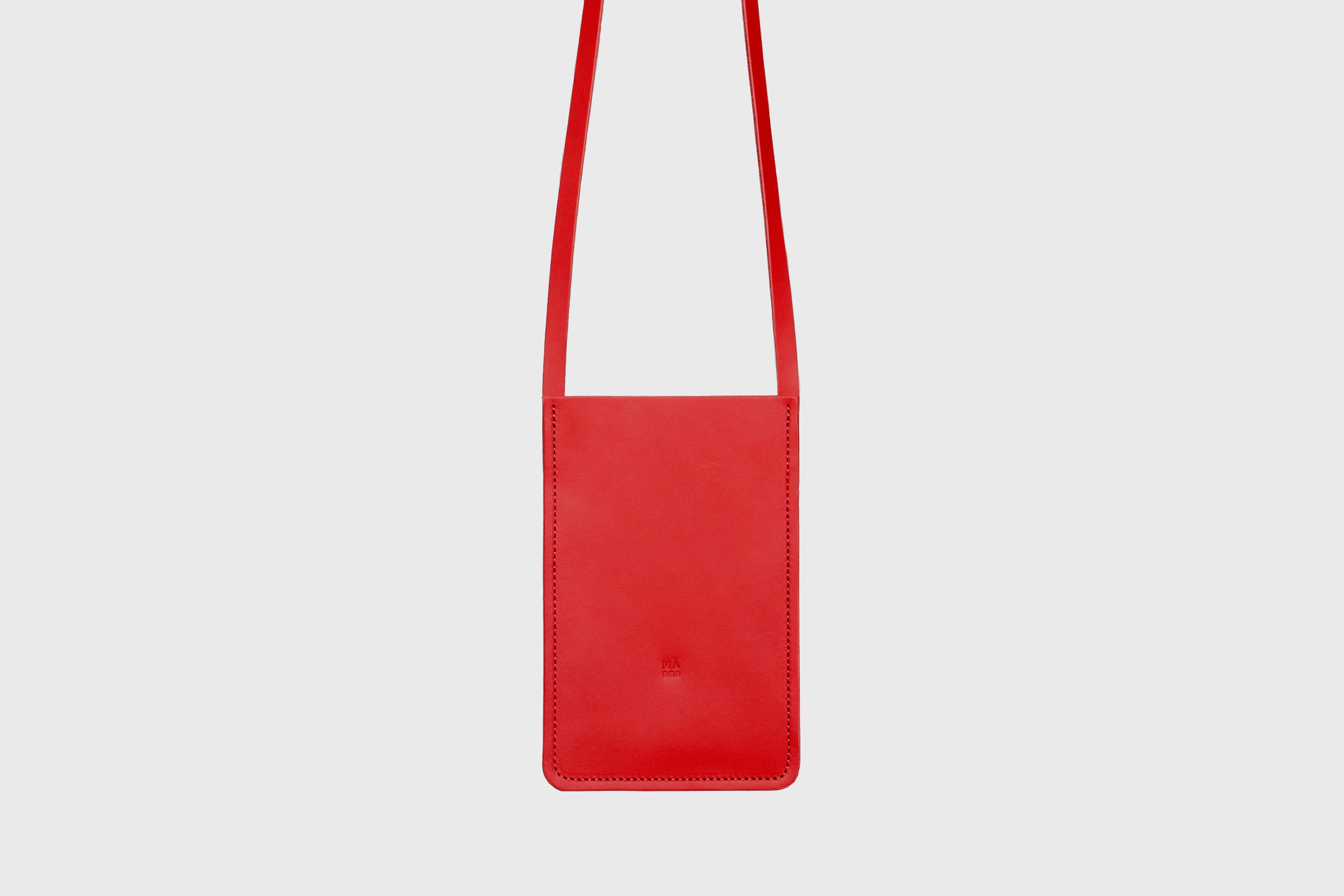 Neck Pouch Leather In Red Color Vegetable Tanned Leather Minimalistic Design Atelier Madre Manuel Dreesmann Barcelona Spain