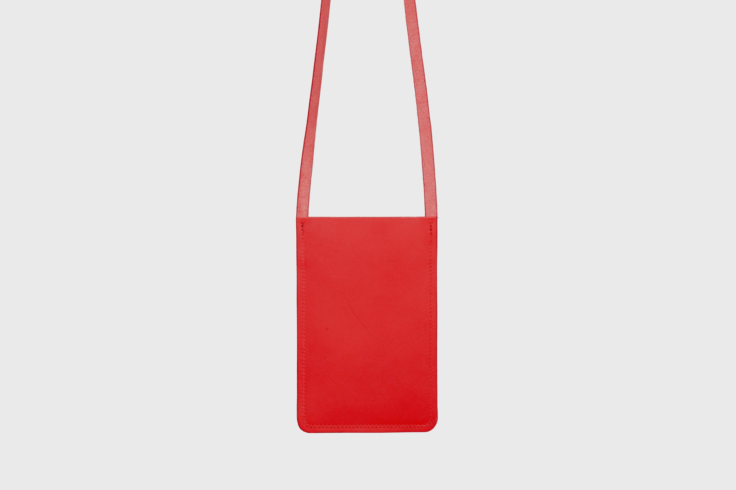 Neck Pouch Leather In Red Color Vegetable Tanned Leather Minimalistic Design Atelier Madre Manuel Dreesmann Barcelona Spain
