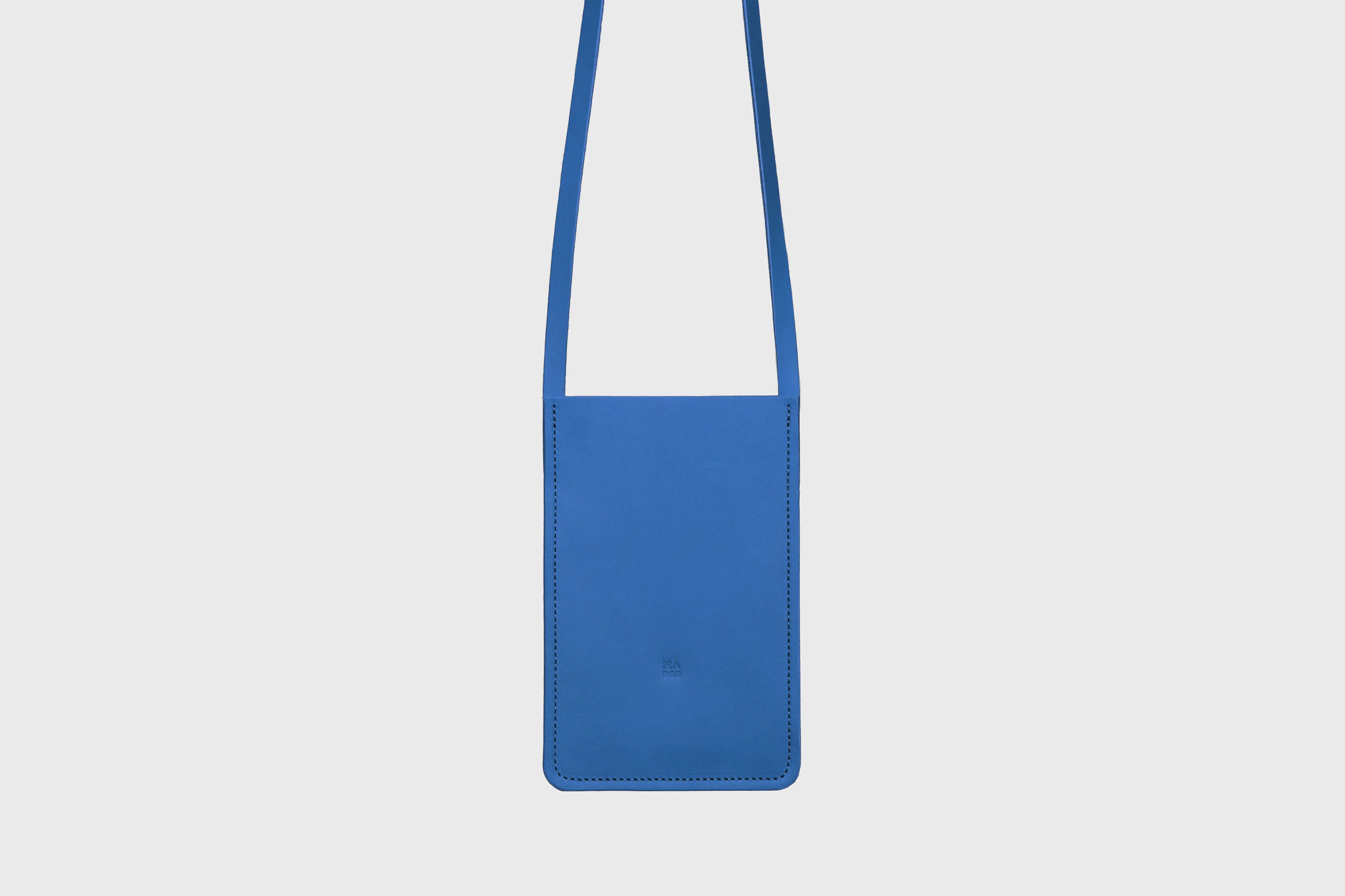 Neck Pouch Leather In Royal Blue Color Vegetable Tanned Leather Minimalistic Design Atelier Madre Manuel Dreesmann Barcelona Spain