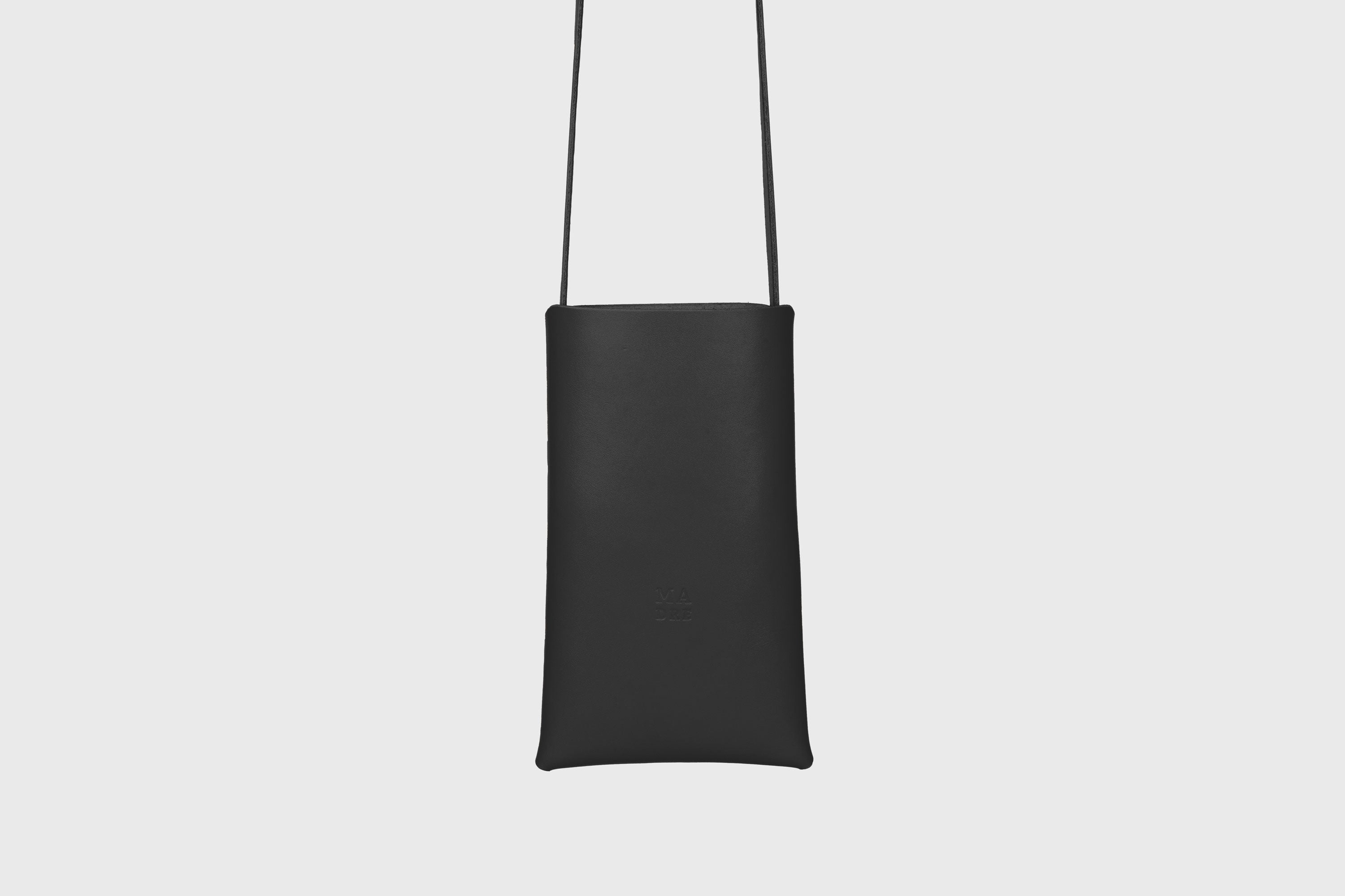 Neck Pouch Wide In Black Leather In Vegetable Tanned Leather Minimalistic Design With Rivets Atelier Madre Manuel Dreesmann Barcelona Spain