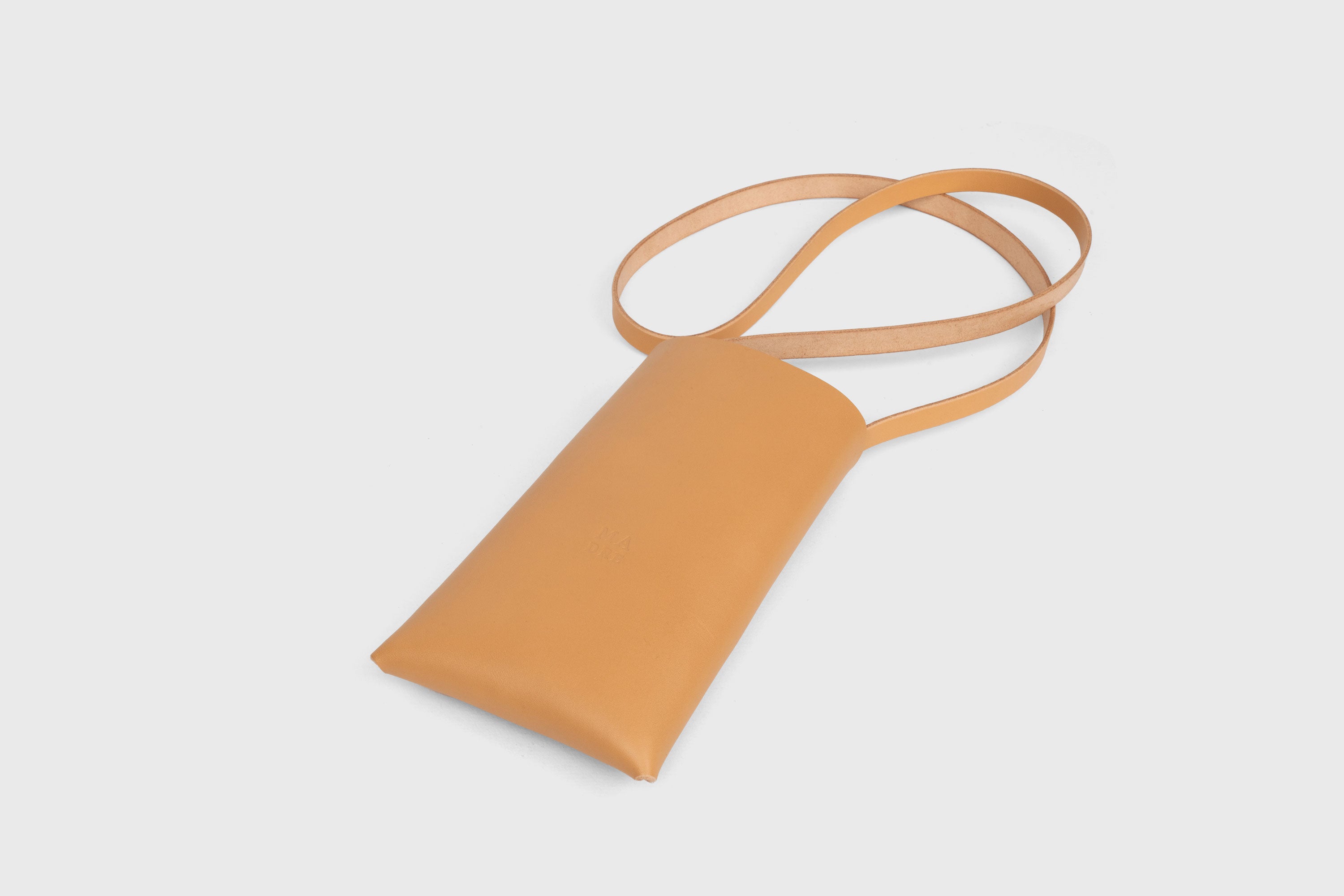 Neck Pouch Wide In Brown Leather In Vegetable Tanned Leather Minimalistic Design With Rivets Atelier Madre Manuel Dreesmann Barcelona Spain