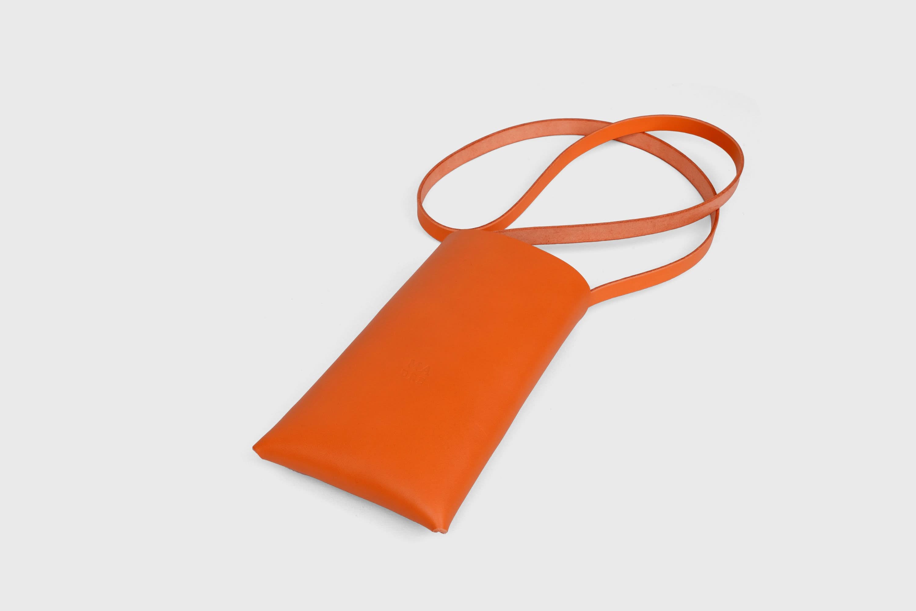 Neck Pouch Wide In Orange Leather In Vegetable Tanned Leather Minimalistic Design With Rivets Atelier Madre Manuel Dreesmann Barcelona Spain