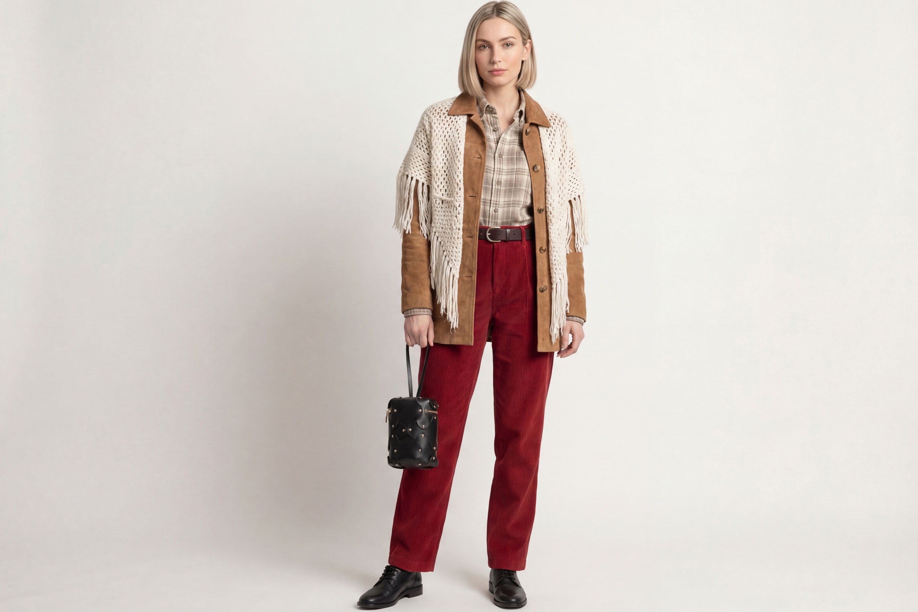 Nema Leather Bag Black Color On A Woman Model Vegetable Tanned Full Grain Spain Brass Rivets Premium Design Minimalist Modern Cylinder Circle Round Zipper Pouch Handbag  Atelier Madre Manuel Dreesmann Barcelona