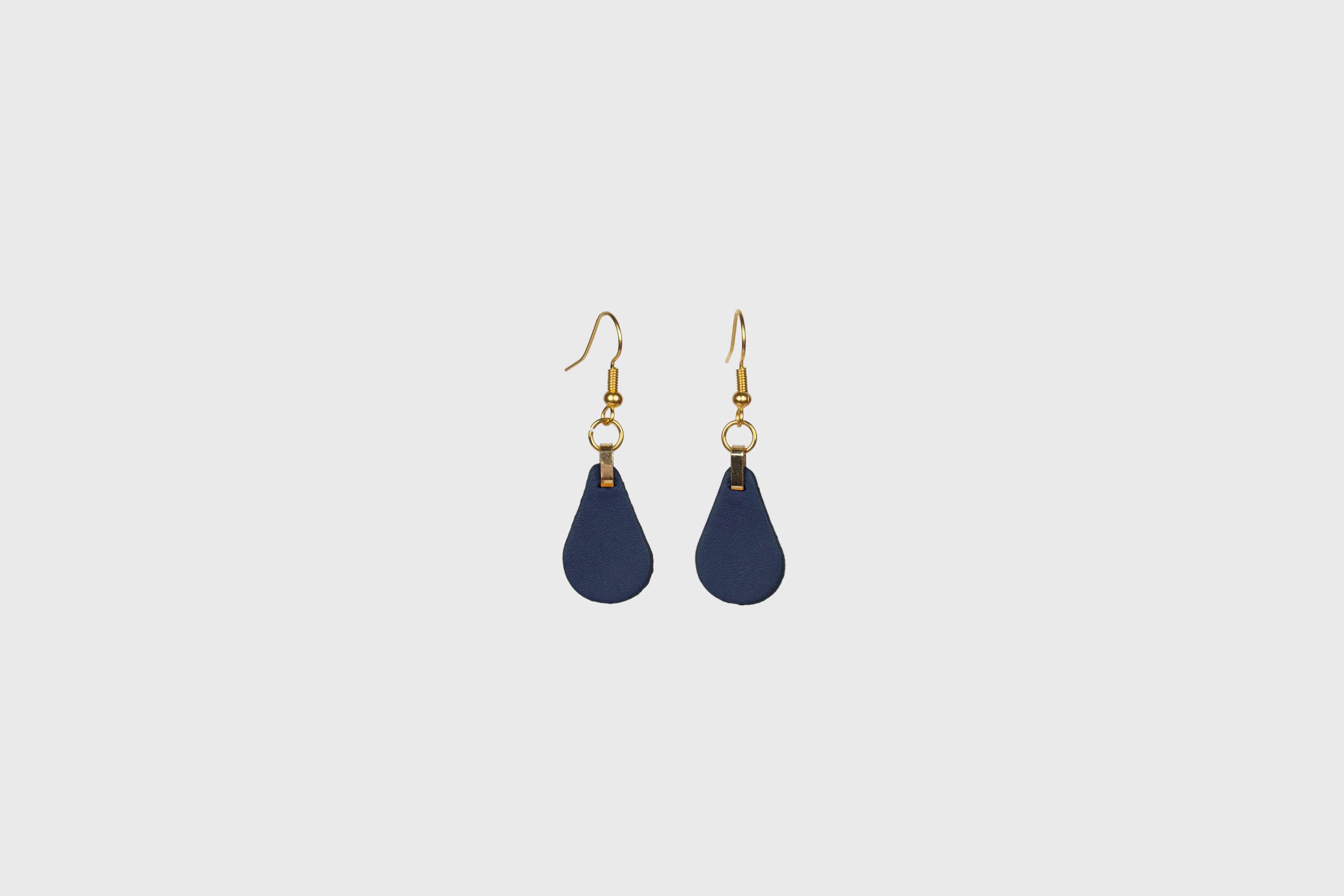 Ona Earrings In Marine Blue Color In Vegetable Tanned Leather Minimalistic Design Atelier Madre Manuel Dreesmann Barcelona Spain