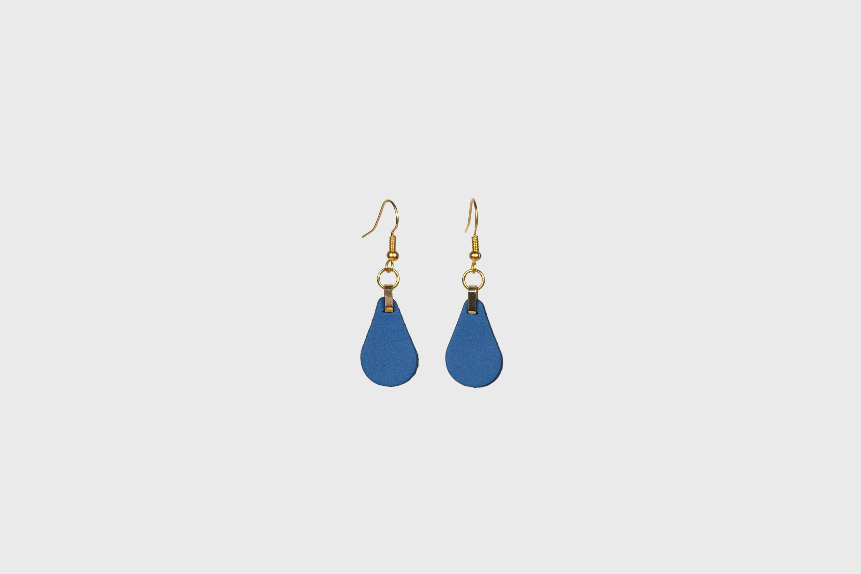 Ona Earrings In Royal Blue Color In Vegetable Tanned Leather Minimalistic Design Atelier Madre Manuel Dreesmann Barcelona Spain