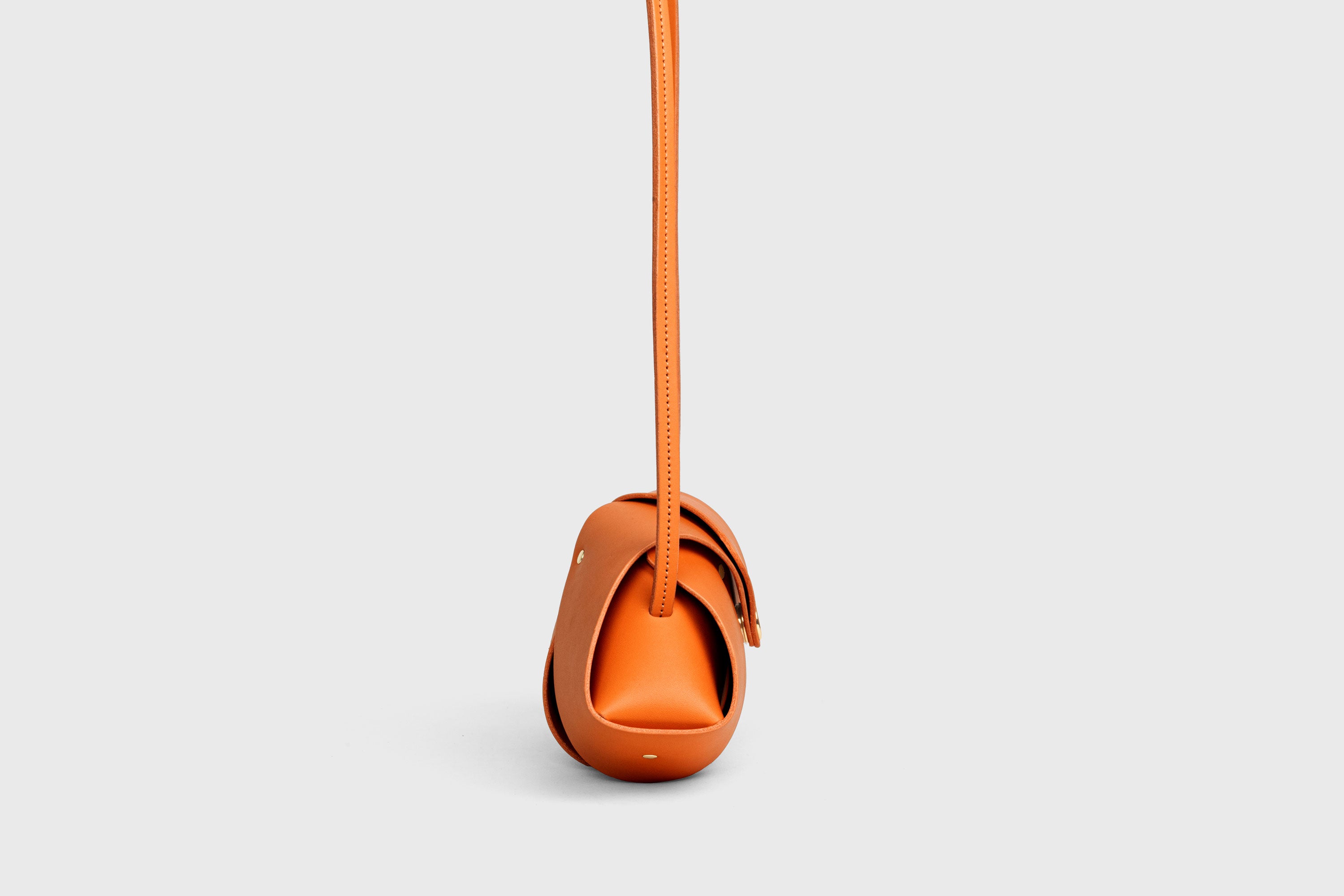 Panino Bag Orange Leather Magnetic Closure Full Grain Vegetable Tanned Leather High Quality Modern Minimalistic Design Atelier Madre Manuel Dreesmann Barcelona Spain