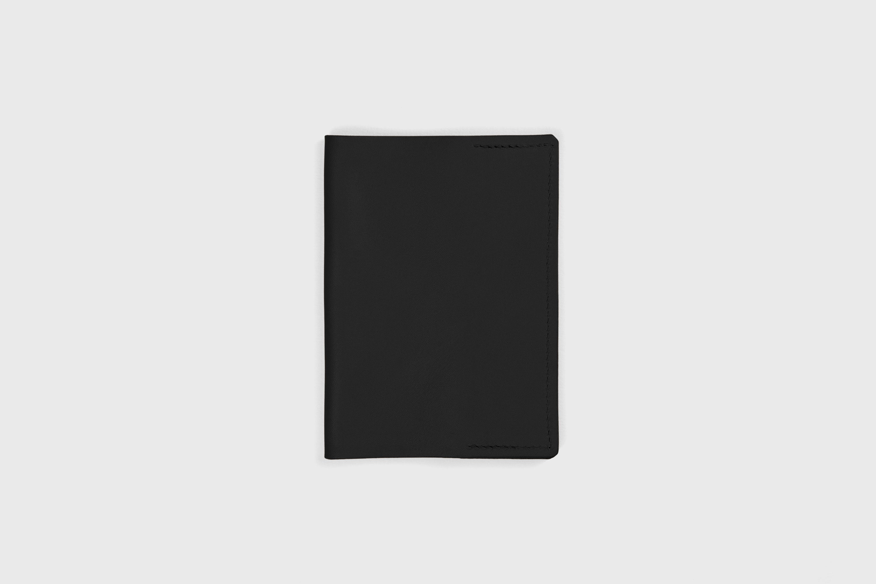 Passport Cover Holder Leather Black Leather Sleeve Case Minimalistic Design Modern Premium Quality Handcraft Vegetable Tanned Leather Manuel Dreesmann Atelier Madre Barcelona Spain