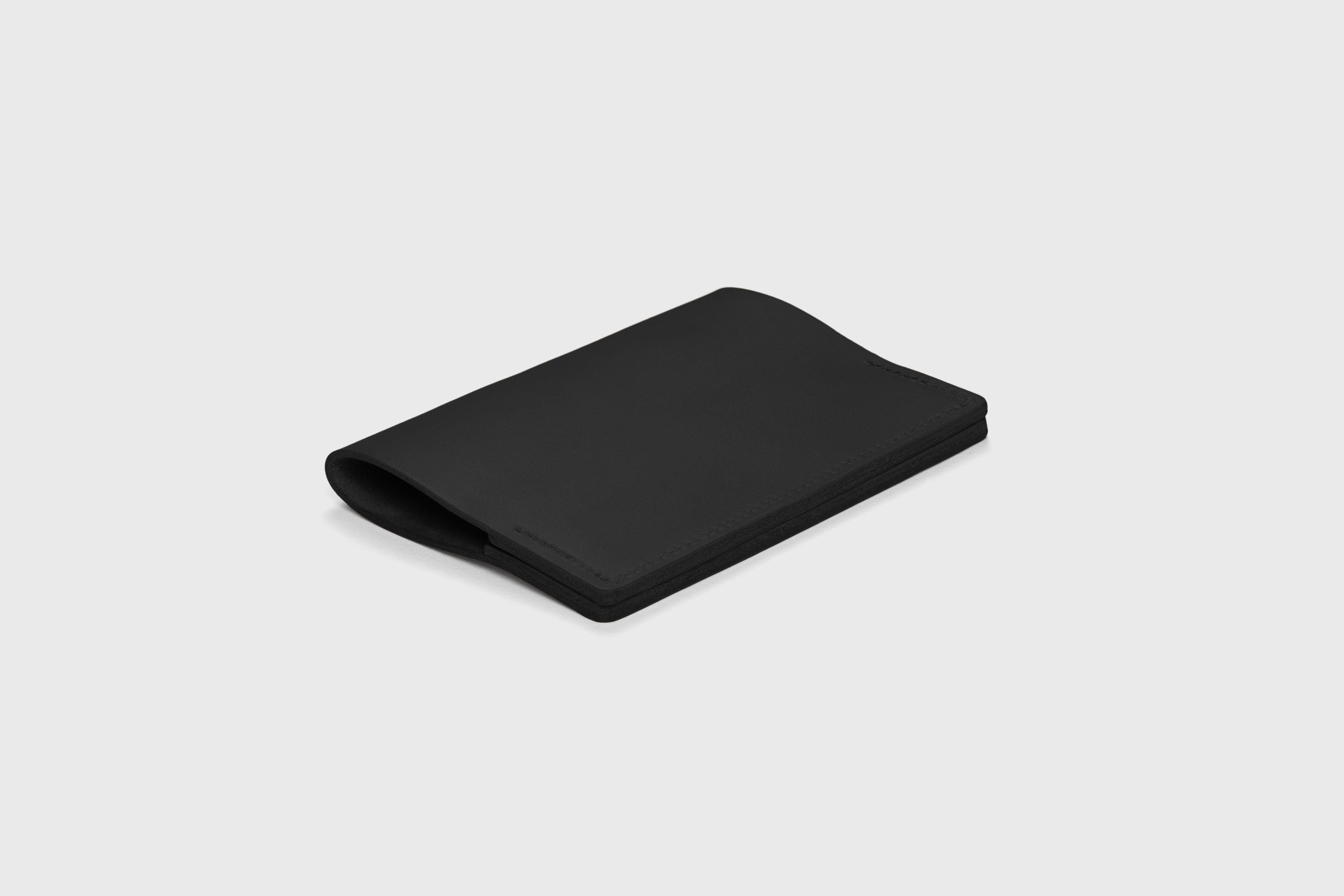 Passport Cover Holder Leather Black Leather Sleeve Case Minimalistic Design Modern Premium Quality Handcraft Vegetable Tanned Leather Manuel Dreesmann Atelier Madre Barcelona Spain