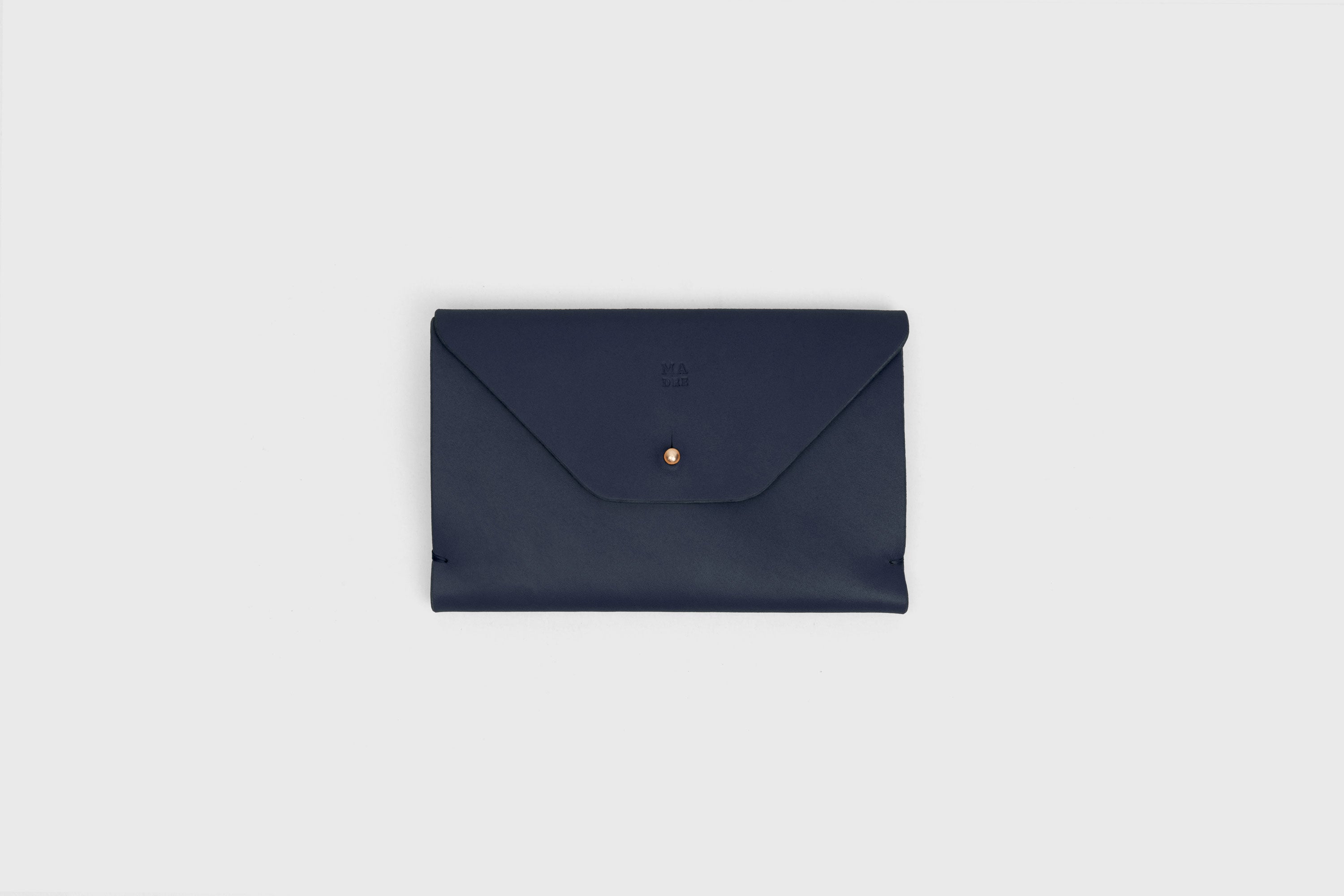 Passport Holder In Marine Blue Color In Vegetable Tanned Leather Minimalistic Design Premium Quality Atelier Madre Manuel Dreesmann Barcelona Spain