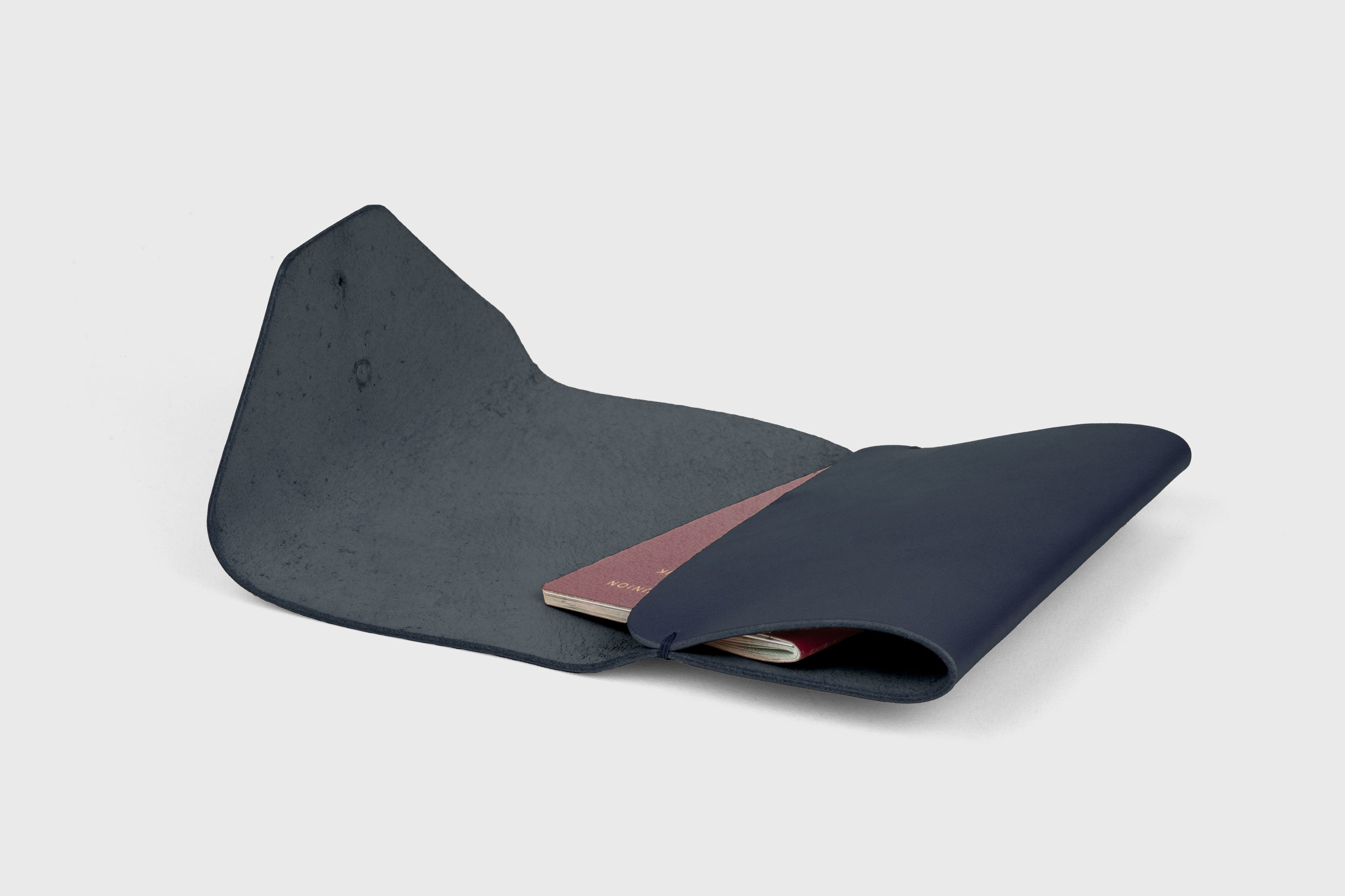 Passport Holder In Marine Blue Color In Vegetable Tanned Leather Minimalistic Design Premium Quality Atelier Madre Manuel Dreesmann Barcelona Spain