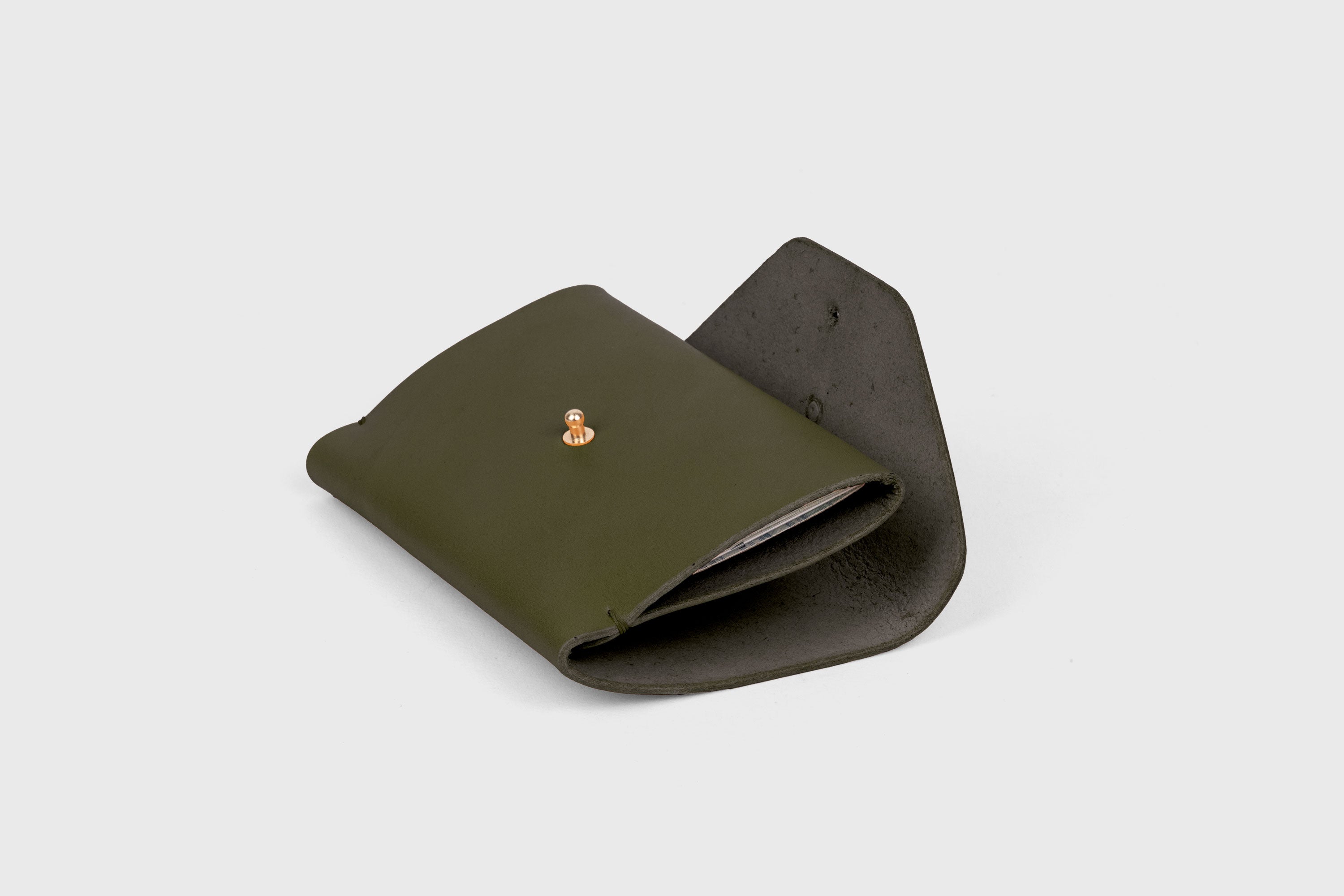 Passport Holder In Olive Green Color In Vegetable Tanned Leather Minimalistic Design Premium Quality Atelier Madre Manuel Dreesmann Barcelona Spain