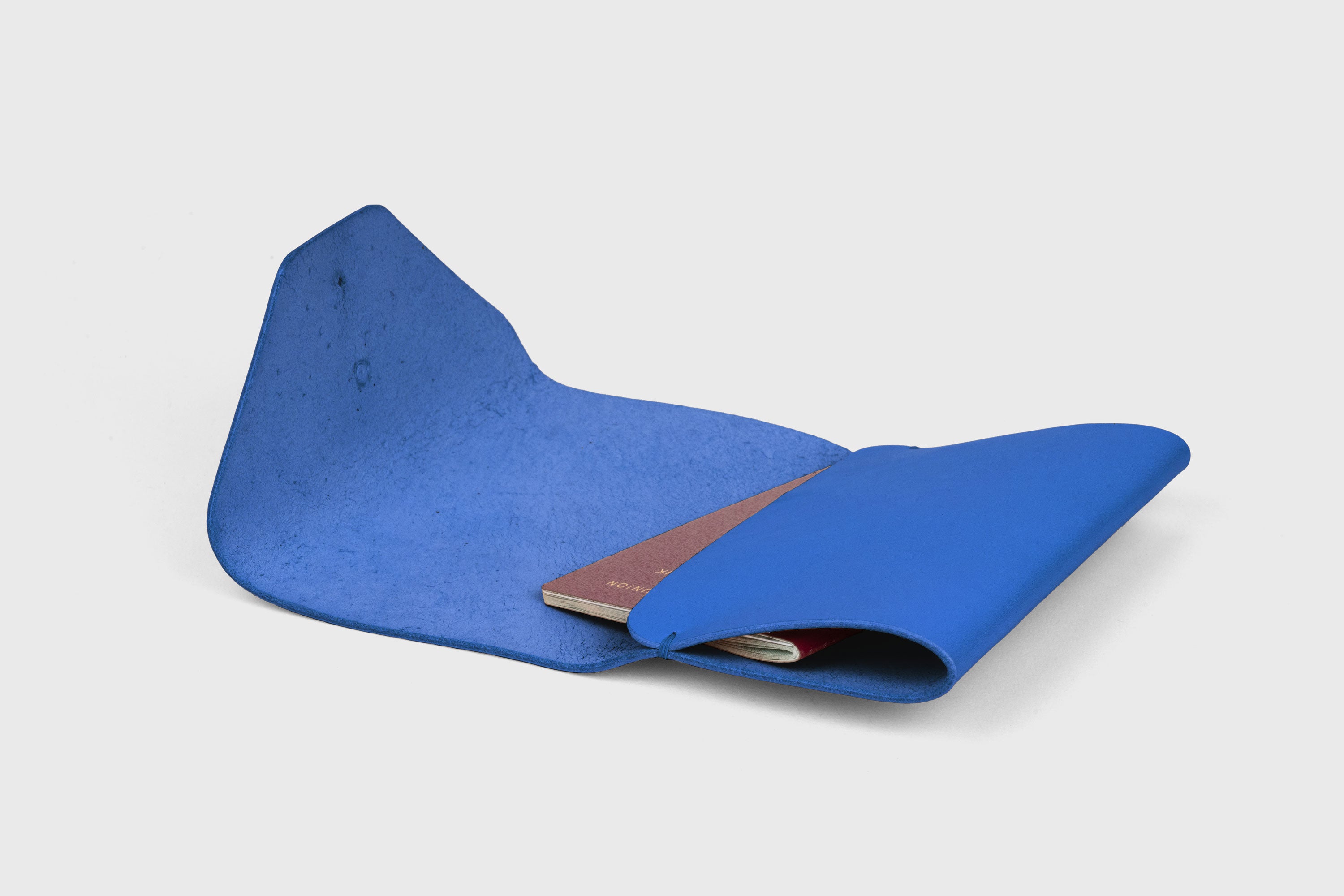 Passport Holder In Royal Blue Color In Vegetable Tanned Leather Minimalistic Design Premium Quality Atelier Madre Manuel Dreesmann Barcelona Spain