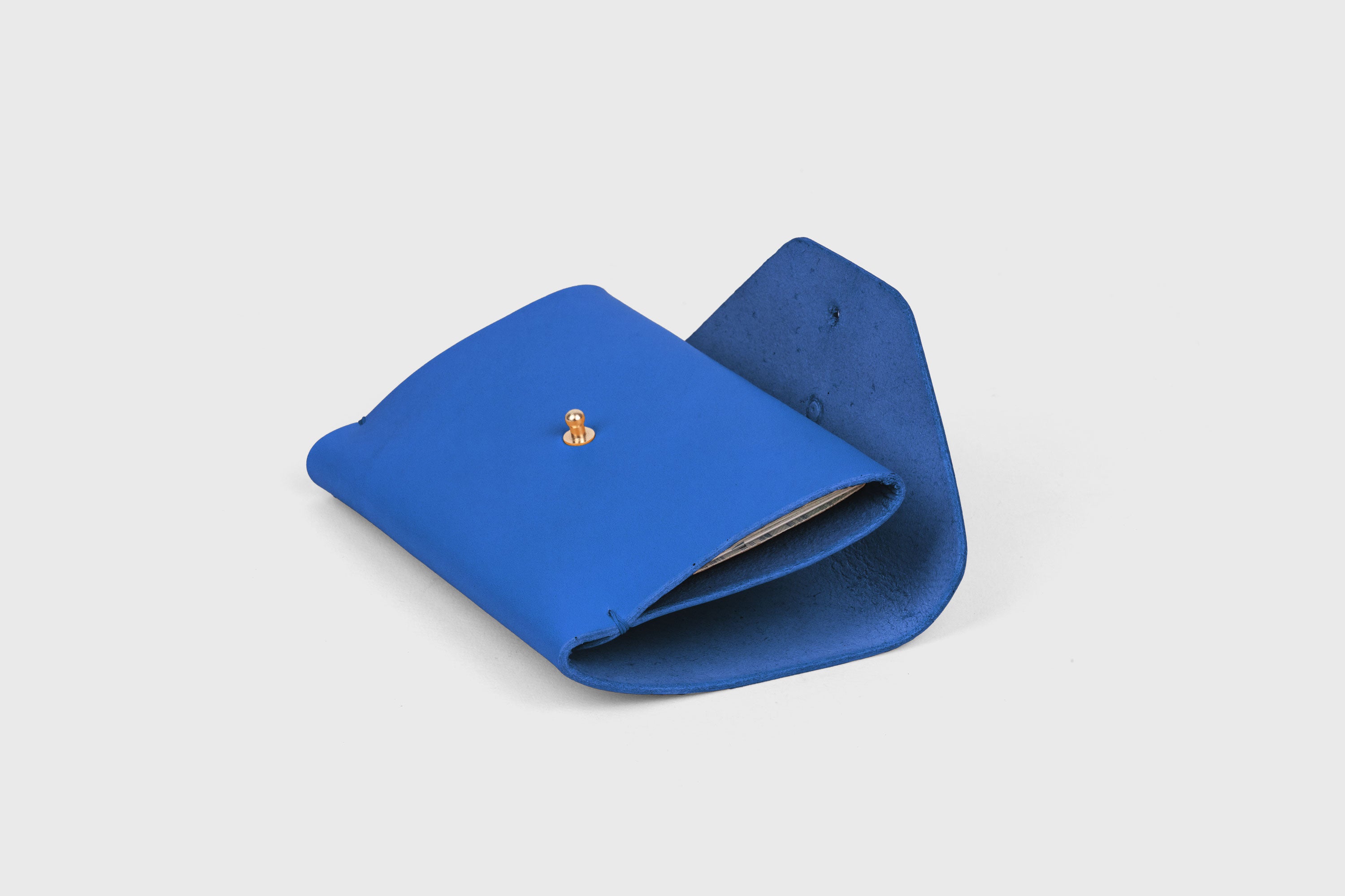 Passport Holder In Royal Blue Color In Vegetable Tanned Leather Minimalistic Design Premium Quality Atelier Madre Manuel Dreesmann Barcelona Spain