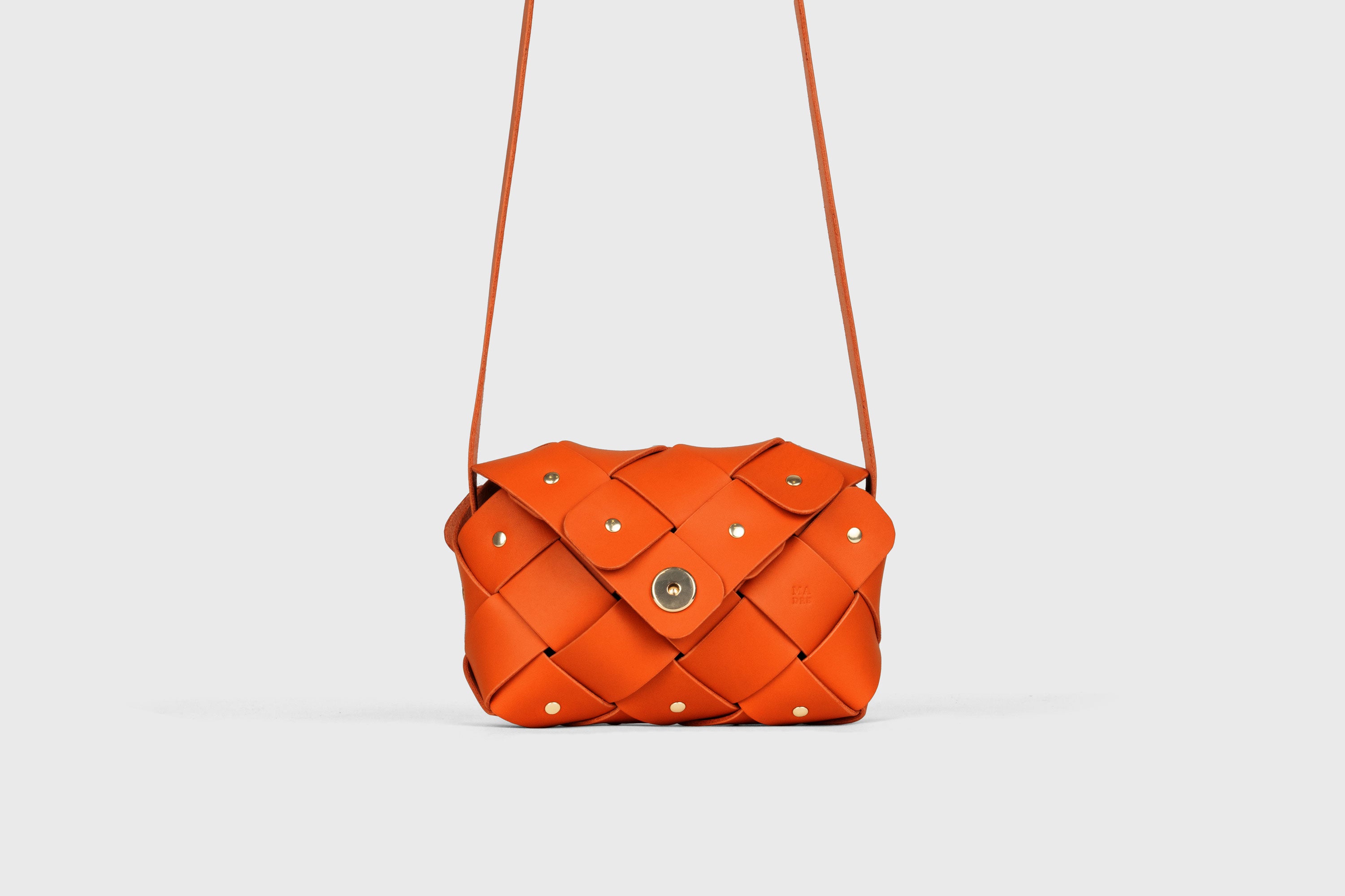 Pine Flap Bag Small In Orange Color In Vegetable Tanned Leather Woven Design Atelier Madre Manuel Dreesmann Barcelona Spain