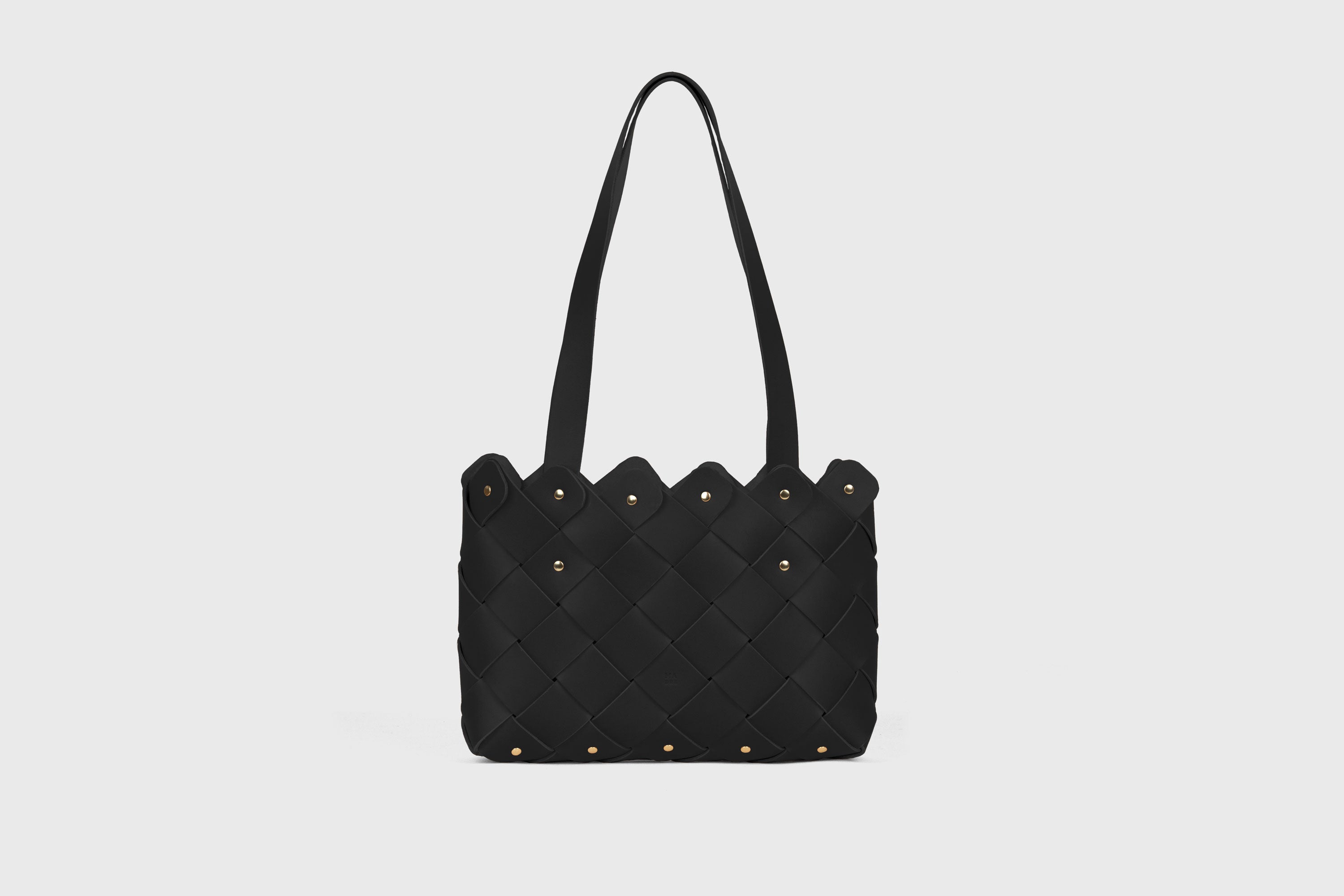 Pine Medium Tote Bag In Black Color In Vegetable Tanned Leather Woven Structure Atelier Madre Manuel Dreesmann Barcelona Spain