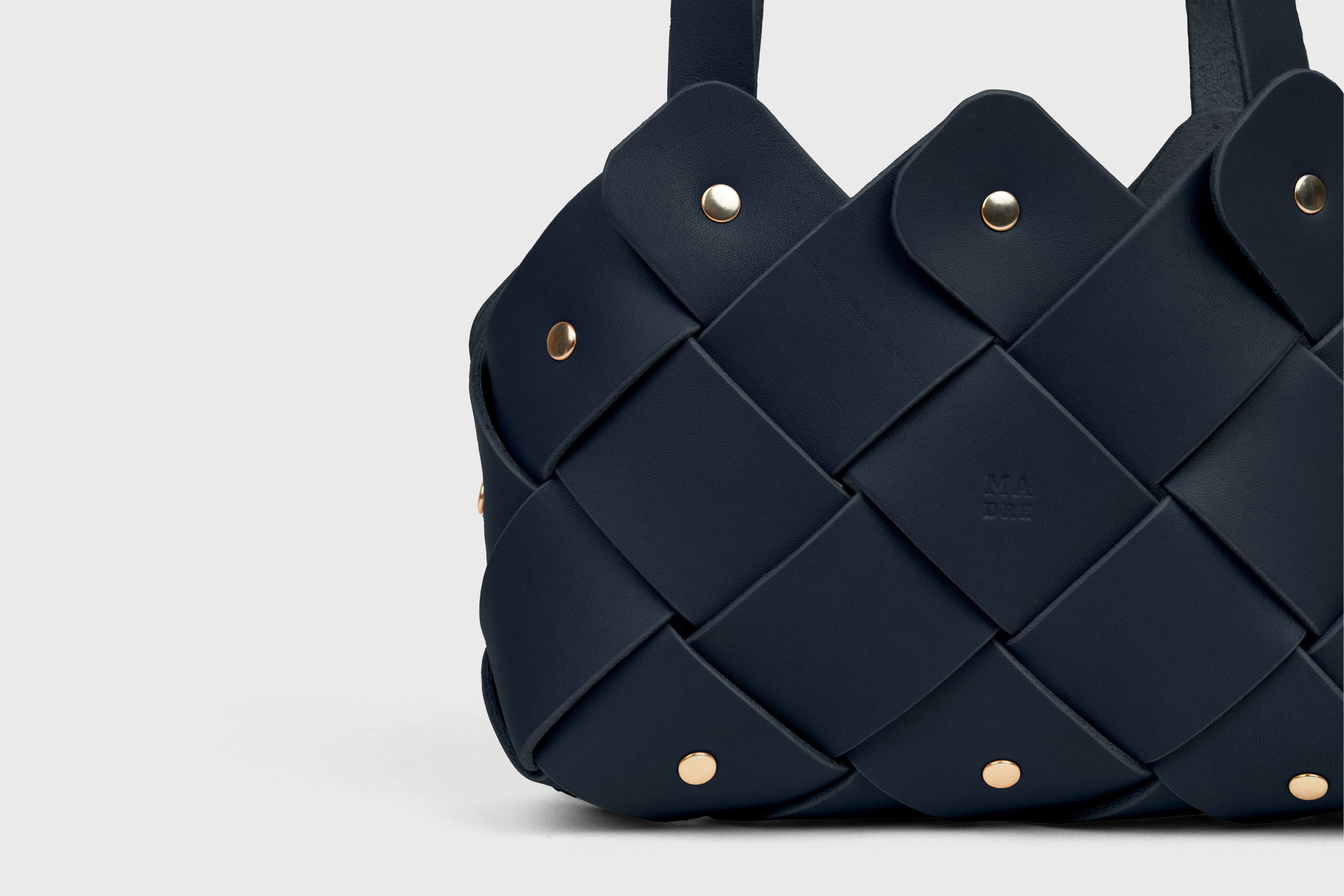 Pine Mini Tote Bag In Marine Blue Color In Vegetable Tanned Leather Woven Technique and Brass Rivets Atelier Madre Manuel Dreesmann Barcelona Spain