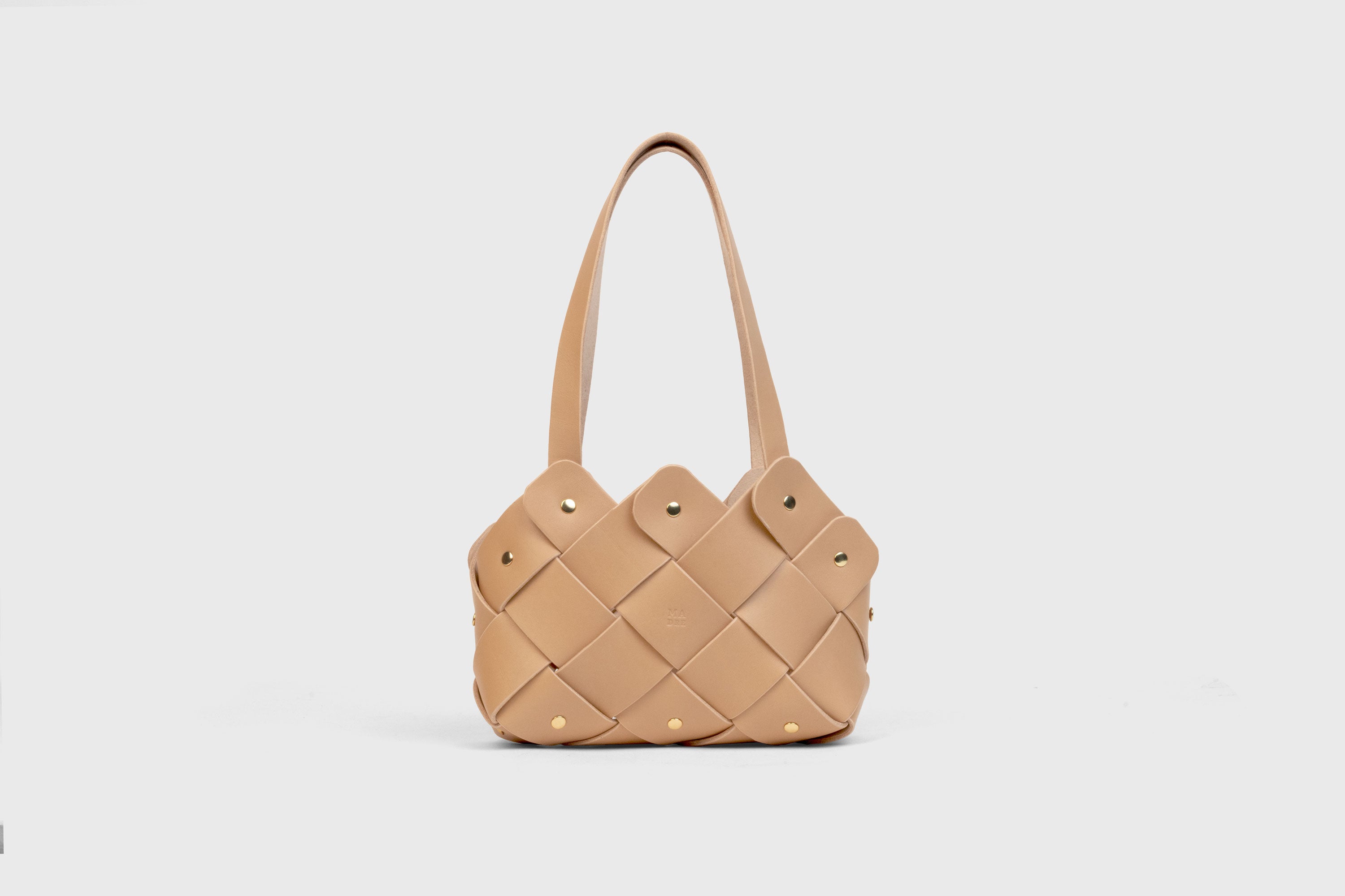 Pine Mini Tote Bag In Natural Color In Vegetable Tanned Leather Woven Technique and Brass Rivets Atelier Madre Manuel Dreesmann Barcelona Spain