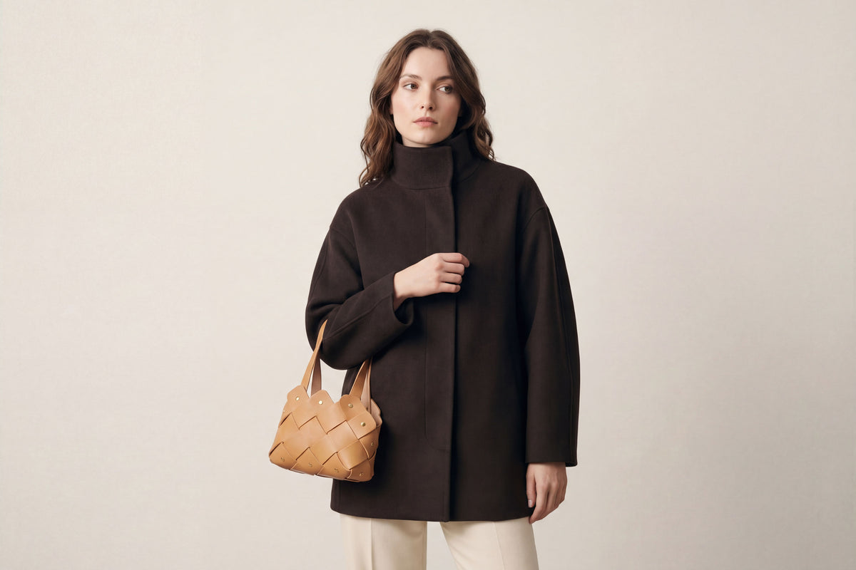 Pine Mini Tote Bag on a model Brown Colour Leather Vegetable Tanned Modern Minimal Design Premium Quality Atelier Madre Manuel Dreesmann Barcelona 2