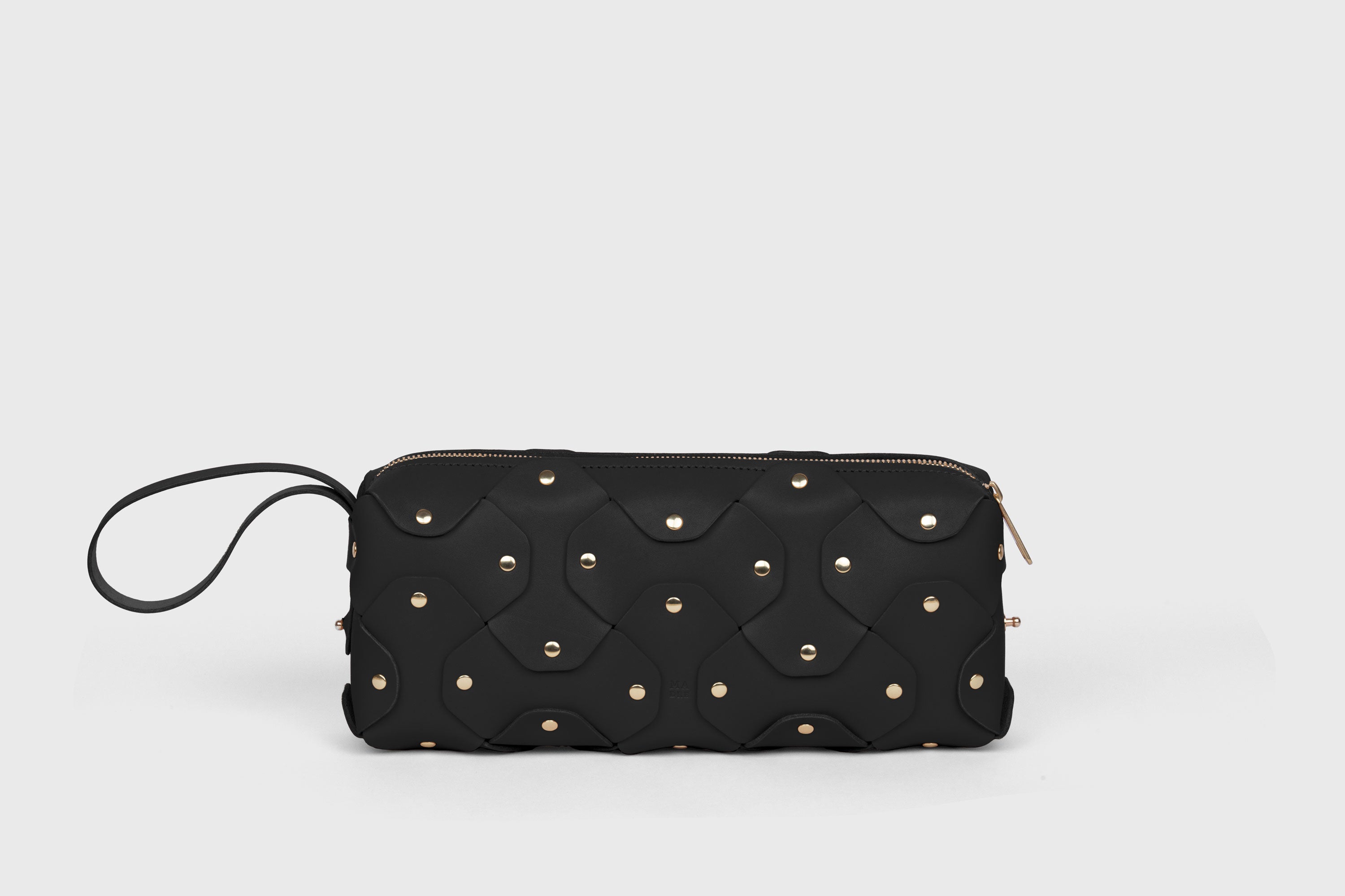 Rivet Bag 01 In Black Color In Vegetable Tanned Leather With Brass Rivets Unique Design Atelier Madre Manuel Dreesmann Barcelona Spain
