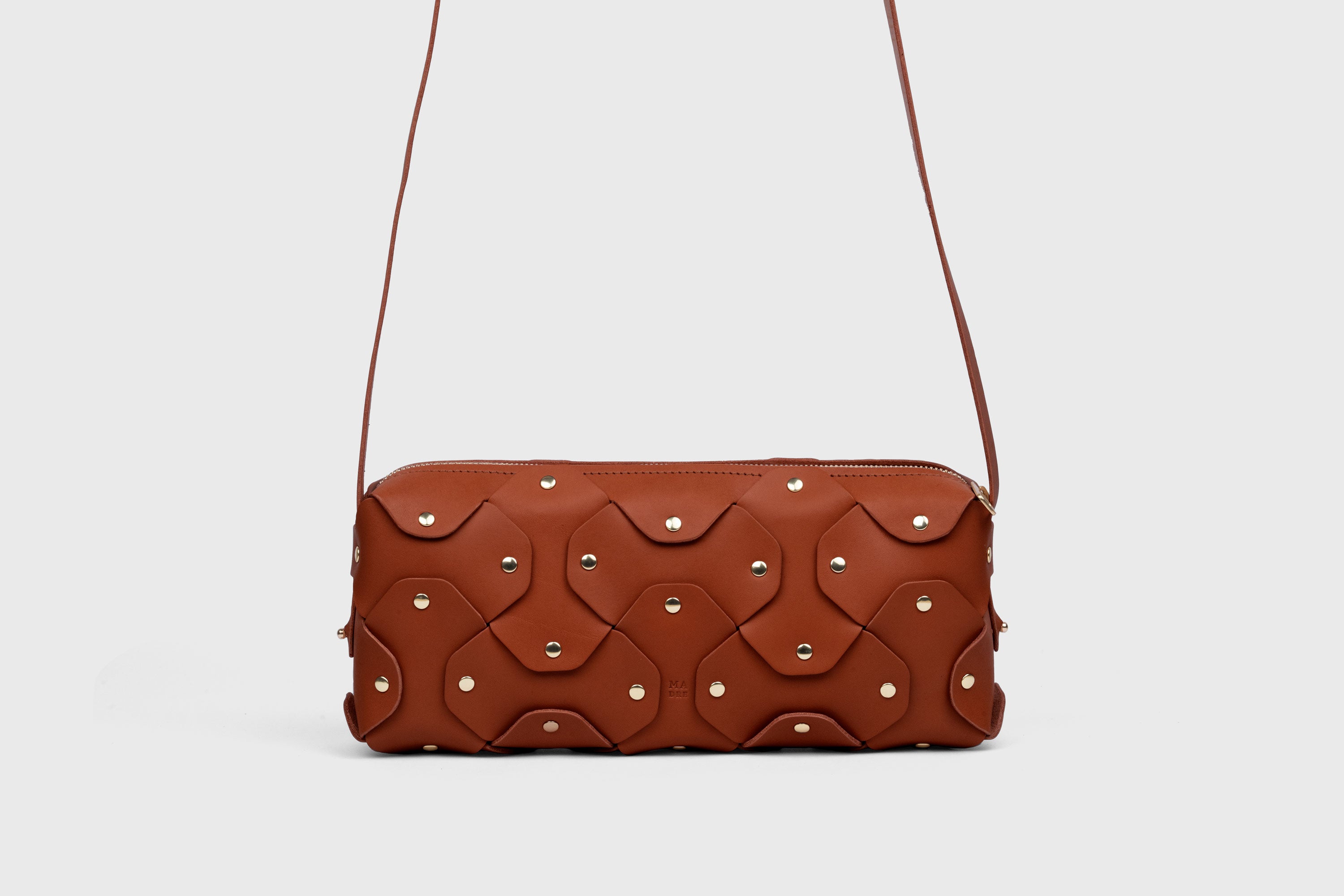 Rivet Bag 01 In Dark Brown Color In Vegetable Tanned Leather With Brass Rivets Unique Design Atelier Madre Manuel Dreesmann Barcelona Spain