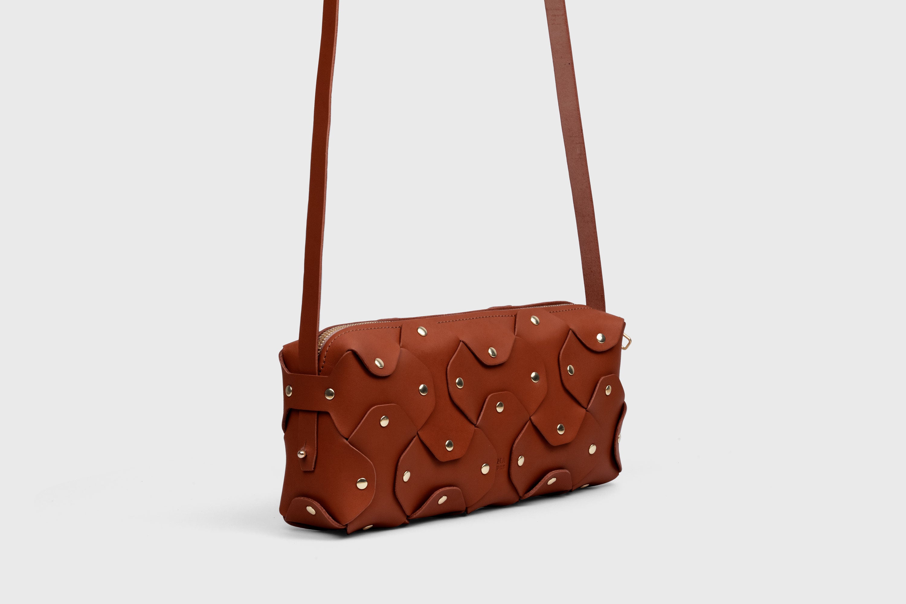 Rivet Bag 01 In Dark Brown Color In Vegetable Tanned Leather With Brass Rivets Unique Design Atelier Madre Manuel Dreesmann Barcelona Spain