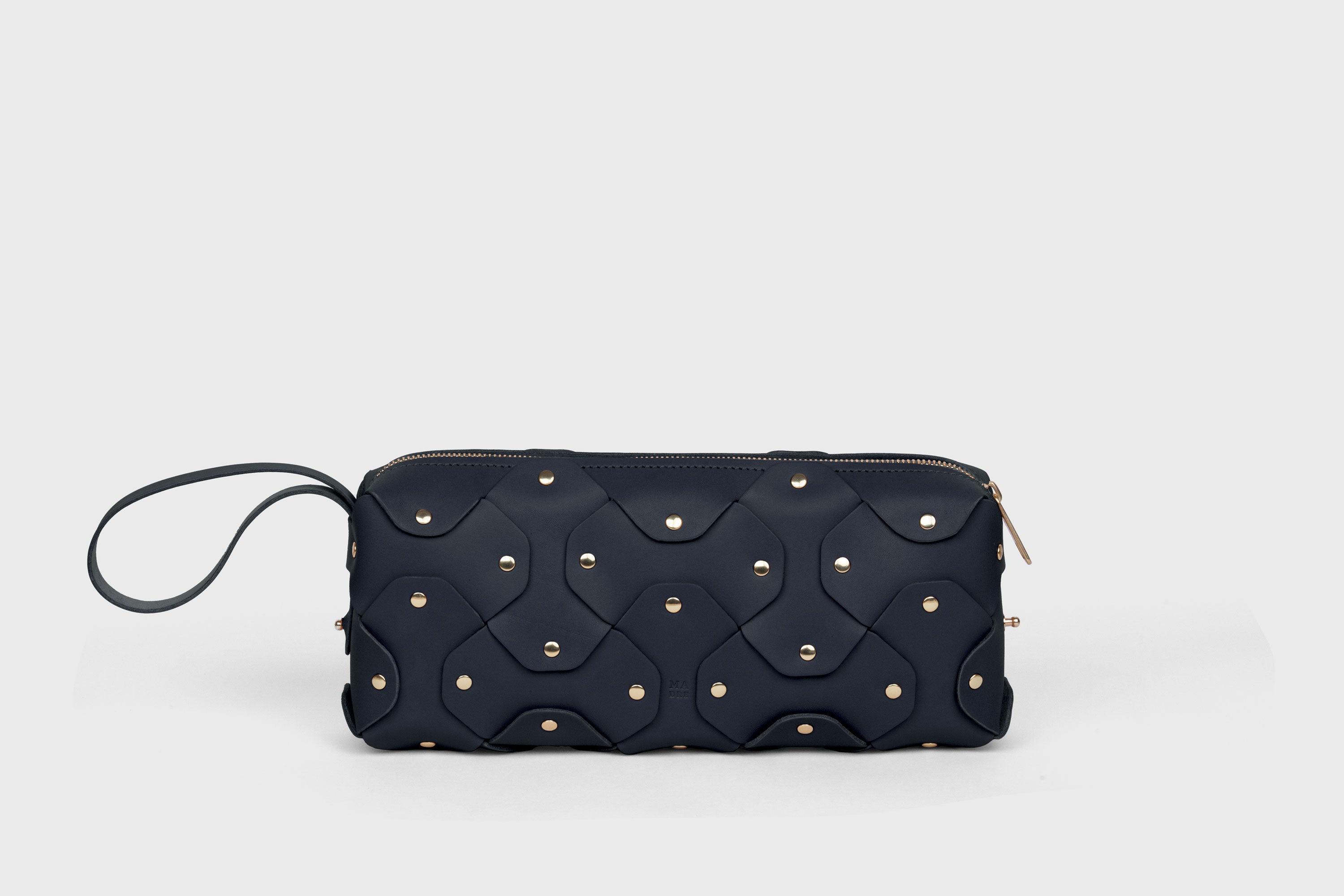 Rivet Bag 01 In Marine Blue Color In Vegetable Tanned Leather With Brass Rivets Unique Design Atelier Madre Manuel Dreesmann Barcelona Spain