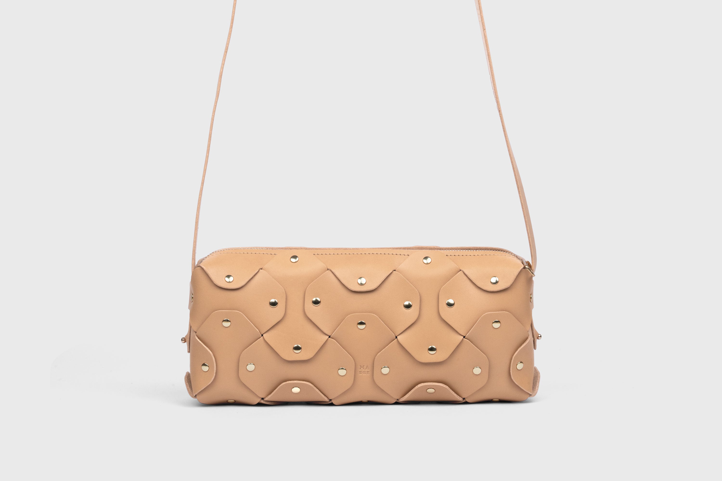 Rivet Bag 01 In Natural Color In Vegetable Tanned Leather With Brass Rivets Unique Design Atelier Madre Manuel Dreesmann Barcelona Spain