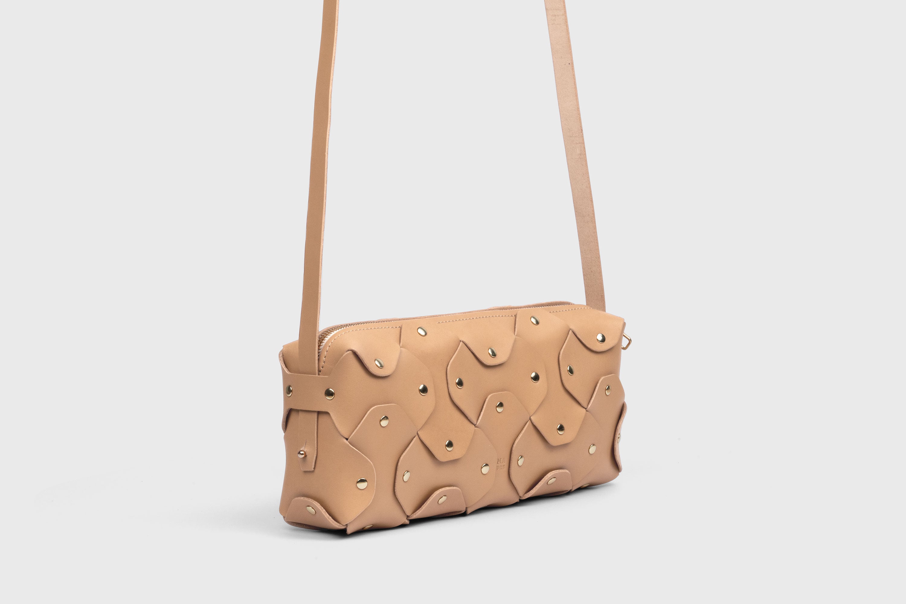 Rivet Bag 01 In Natural Color In Vegetable Tanned Leather With Brass Rivets Unique Design Atelier Madre Manuel Dreesmann Barcelona Spain