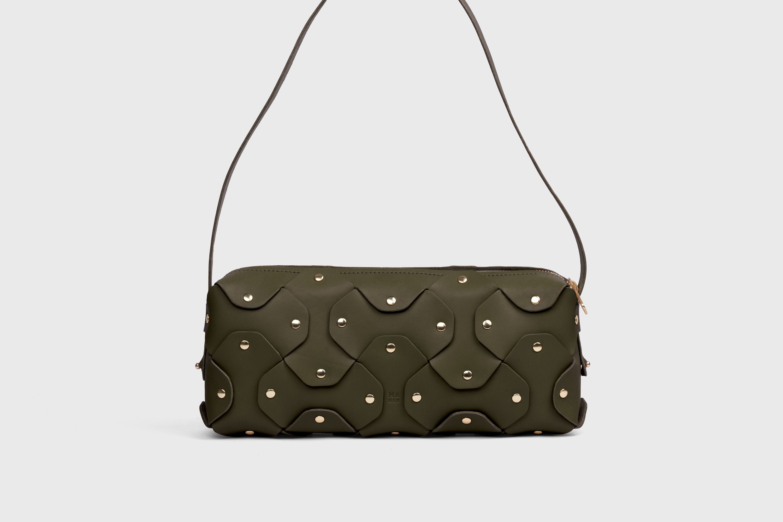 Rivet Bag 01 In Olive Green Color In Vegetable Tanned Leather With Brass Rivets Unique Design Atelier Madre Manuel Dreesmann Barcelona Spain