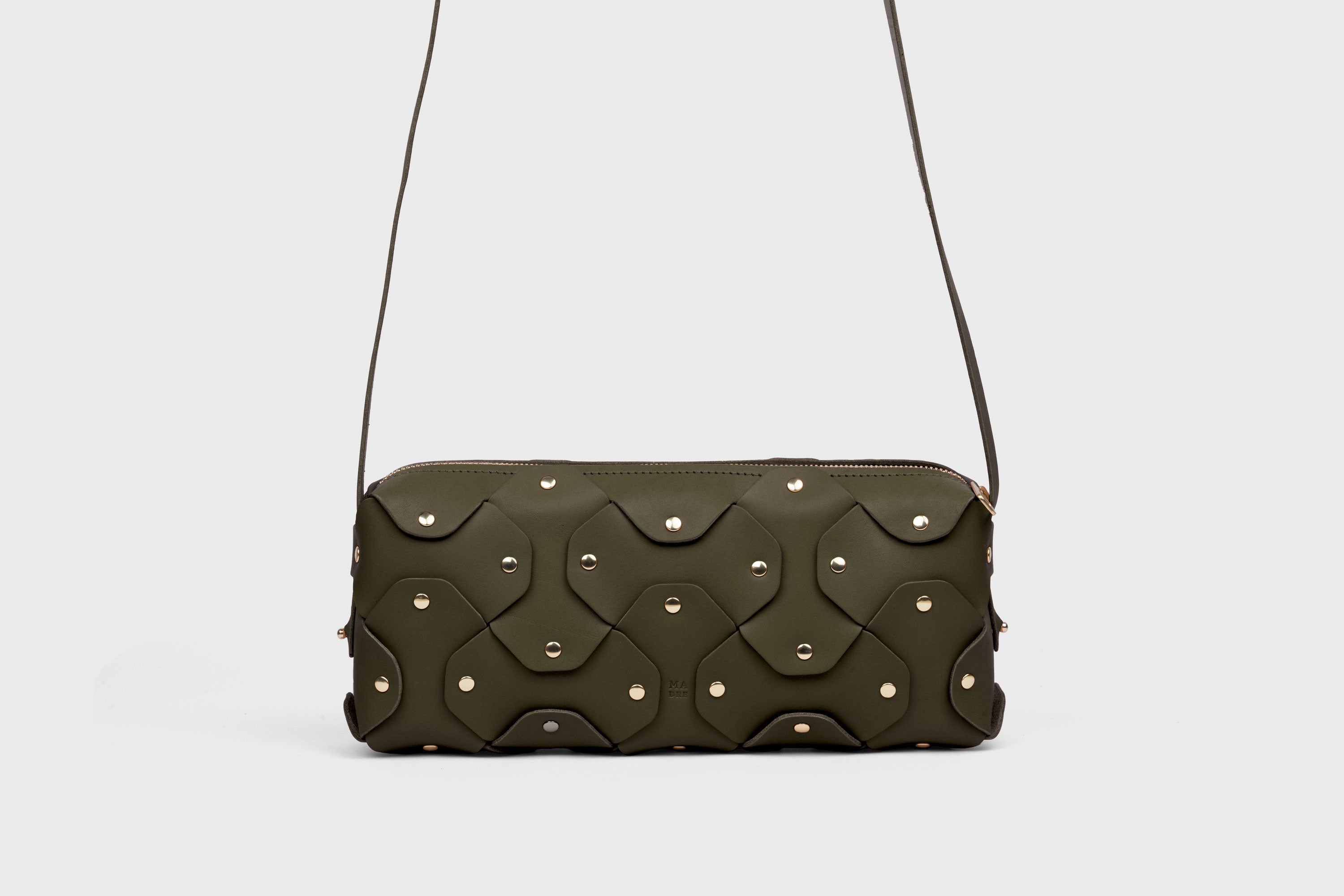 Rivet Bag 01 In Olive Green Color In Vegetable Tanned Leather With Brass Rivets Unique Design Atelier Madre Manuel Dreesmann Barcelona Spain