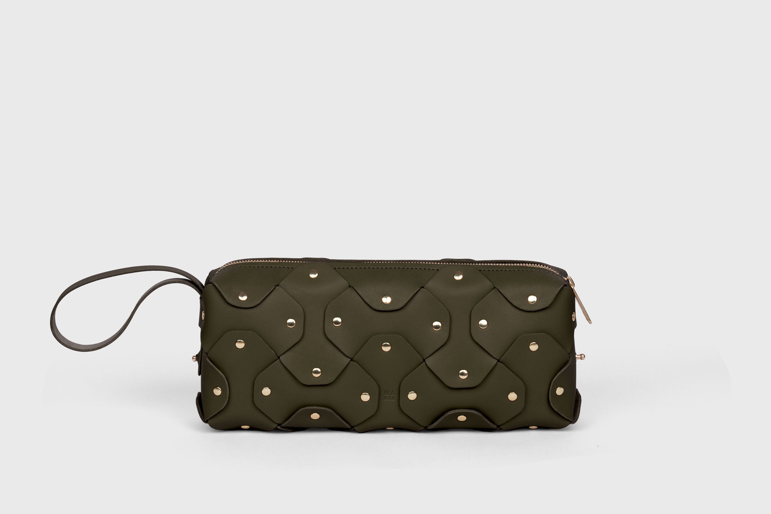 Rivet Bag 01 In Olive Green Color In Vegetable Tanned Leather With Brass Rivets Unique Design Atelier Madre Manuel Dreesmann Barcelona Spain