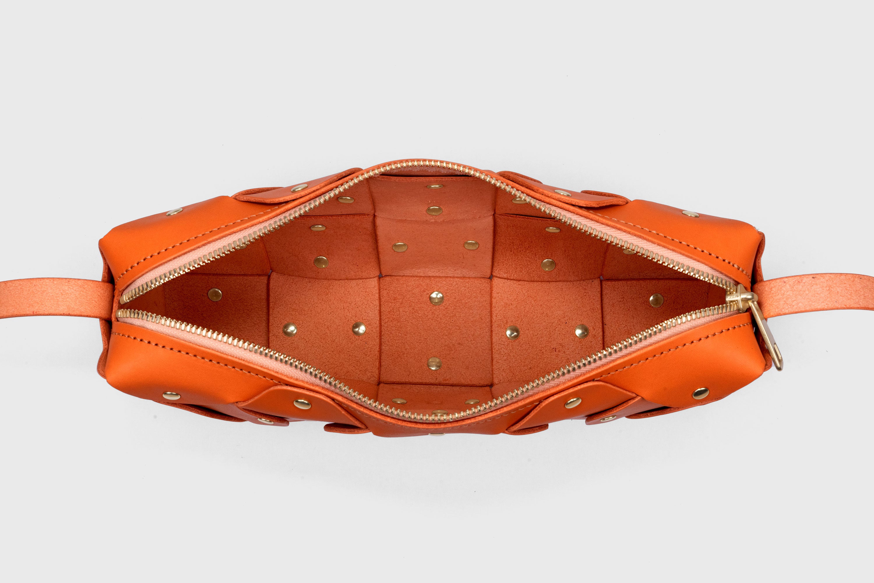 Rivet Bag 01 In Orange Color In Vegetable Tanned Leather With Brass Rivets Unique Design Atelier Madre Manuel Dreesmann Barcelona Spain
