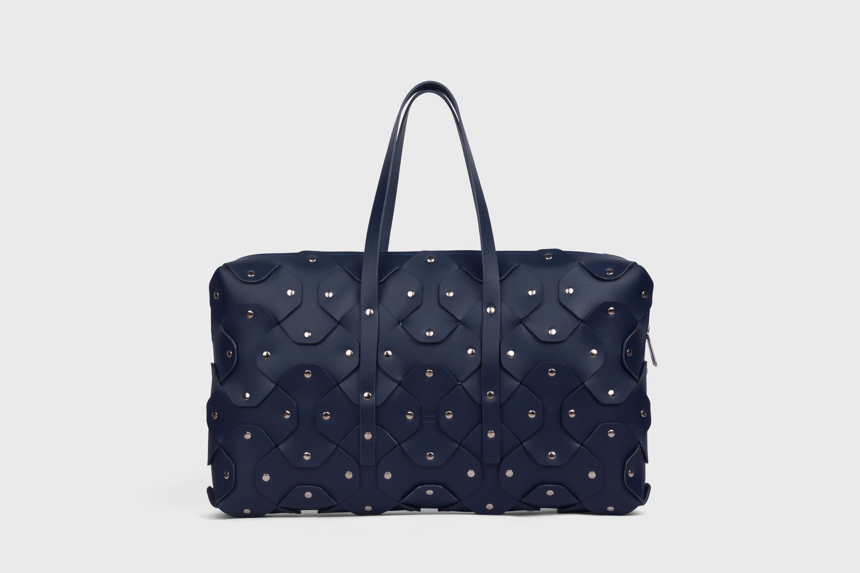 Rivet Briefcase In Marine Blue Color In Vegetable Tanned Leather With Brass Rivets Unique Design Atelier Madre Manuel Dreesmann Barcelona Spain