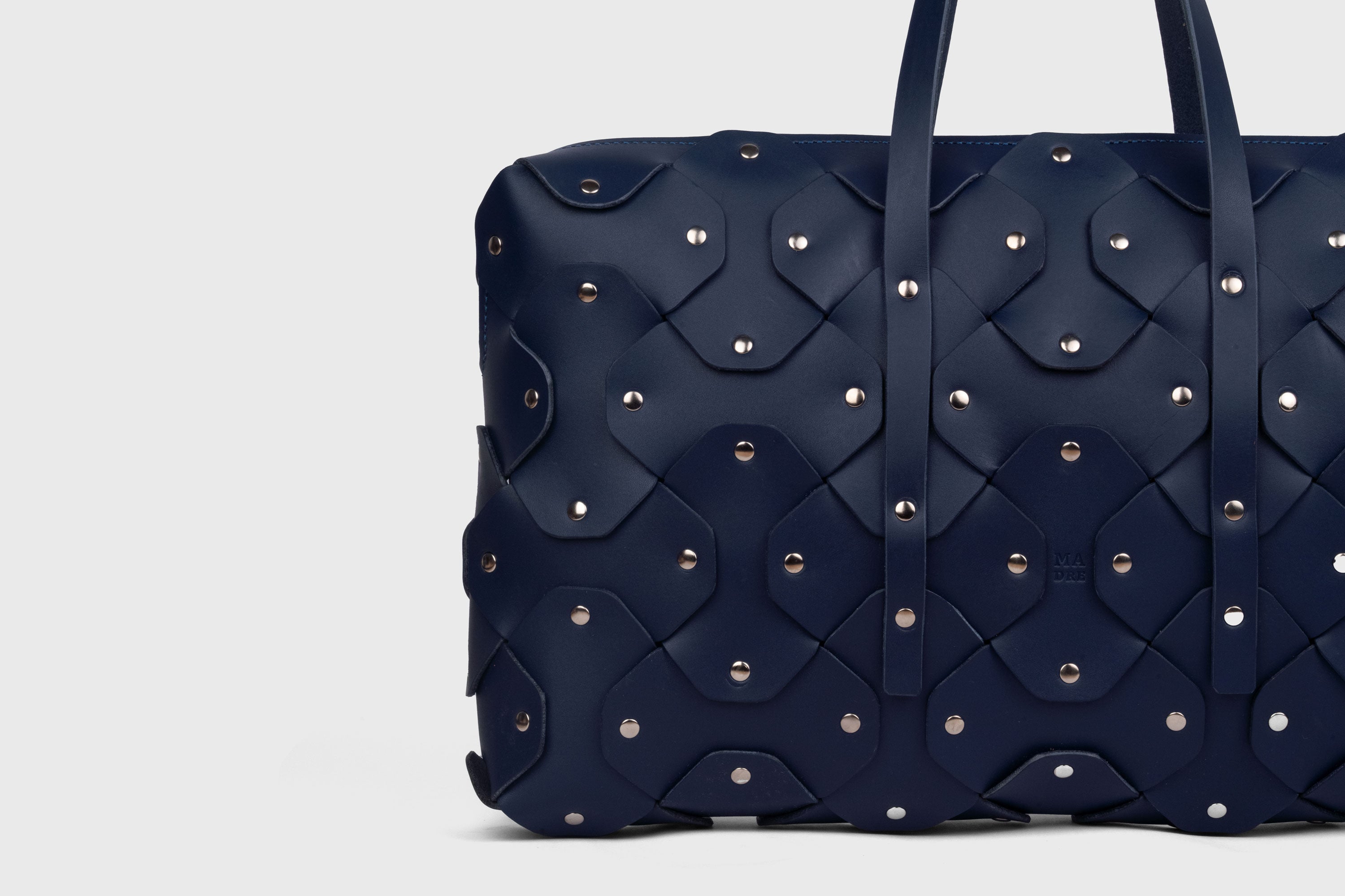 Rivet Briefcase In Marine Blue Color In Vegetable Tanned Leather With Brass Rivets Unique Design Atelier Madre Manuel Dreesmann Barcelona Spain