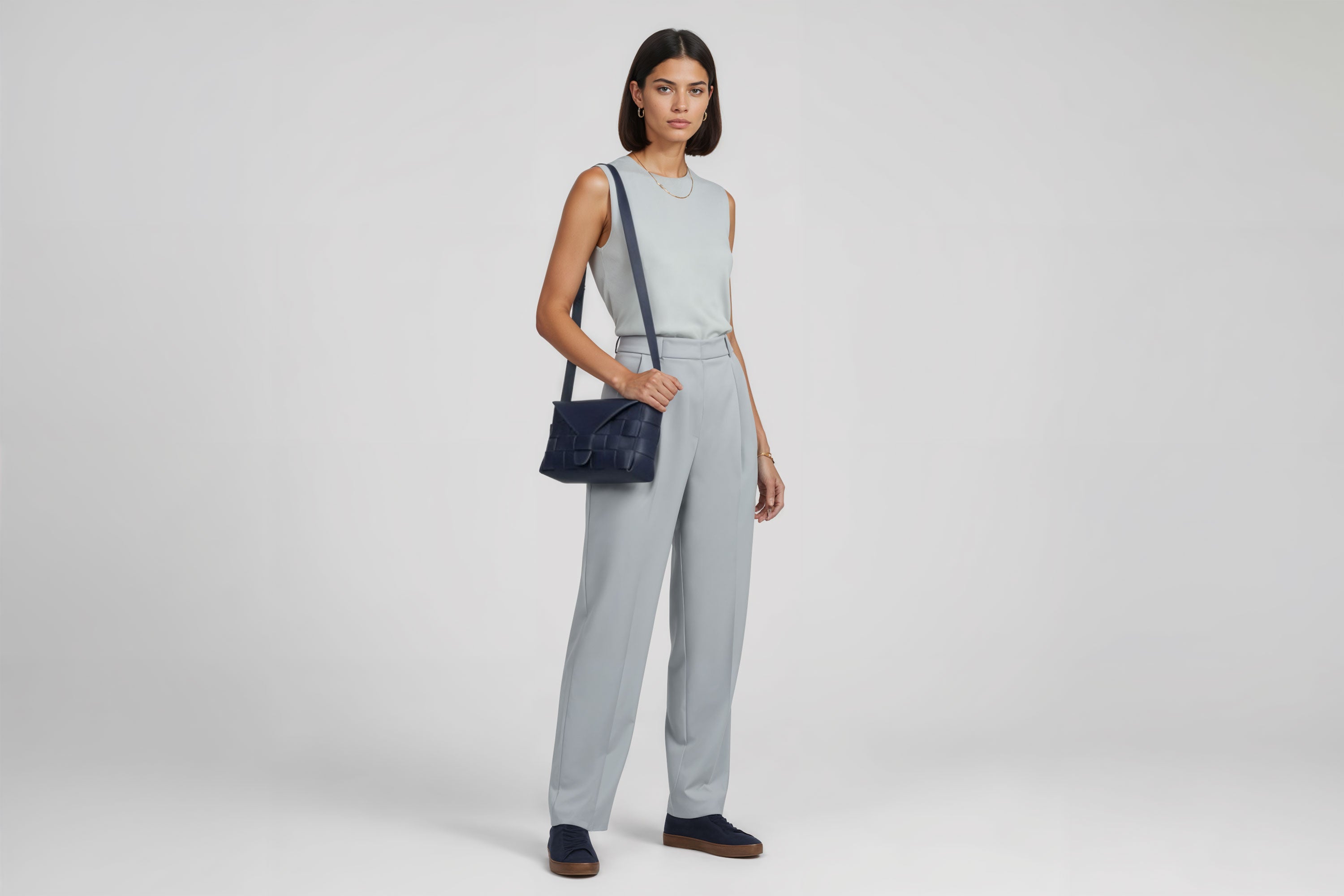 Leather Bag Marine Blue Color Big Saka On A Woman Model Braided  Vegetable Tanned Leather Modern Minimalist Design Premium Quality Atelier Madre Manuel Dreesmann Barcelona Spain