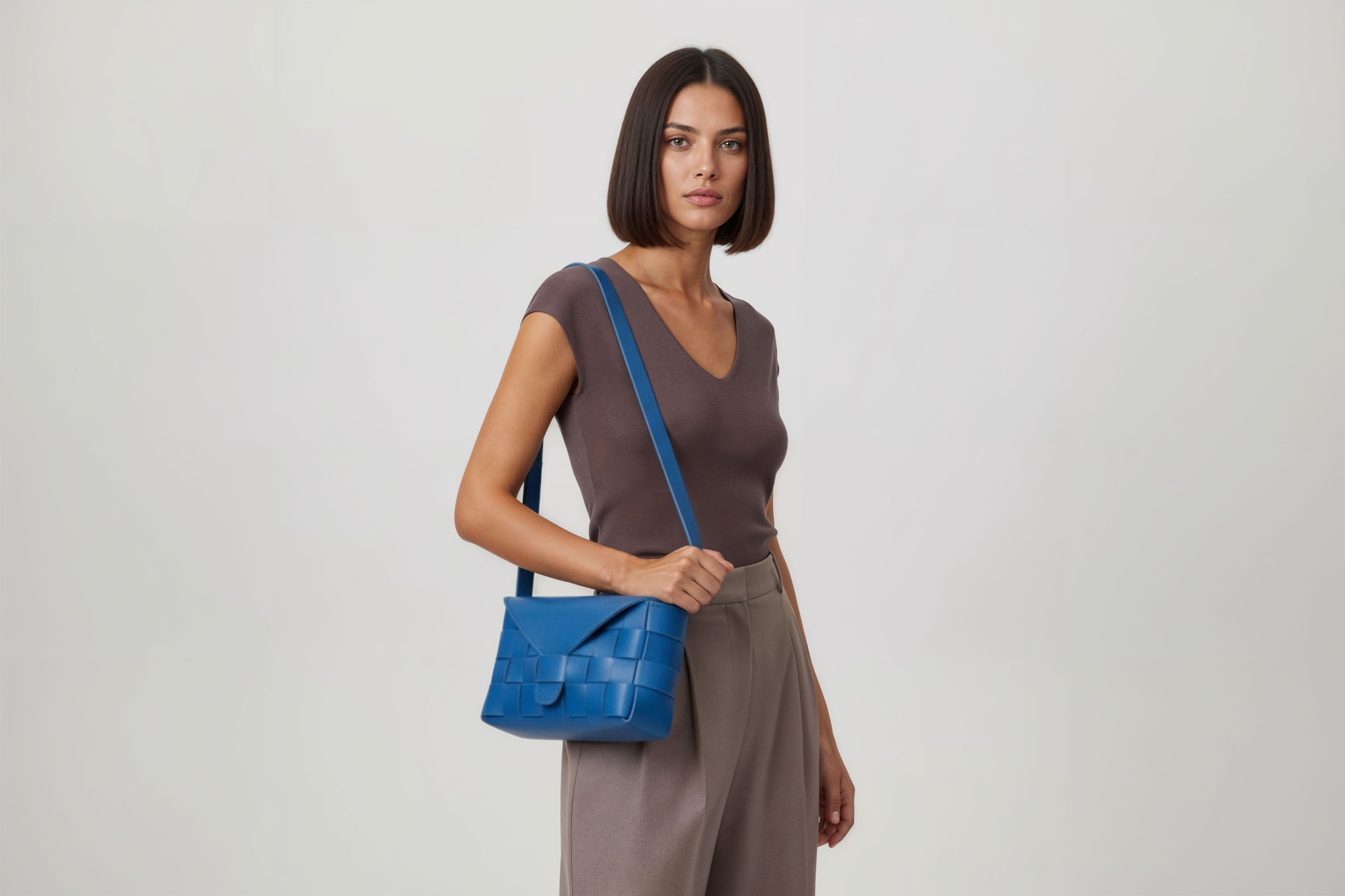 Leather Bag Royal Blue Color Big Saka On A Woman Model Braided  Vegetable Tanned Leather Modern Minimalist Design Premium Quality Atelier Madre Manuel Dreesmann Barcelona Spain