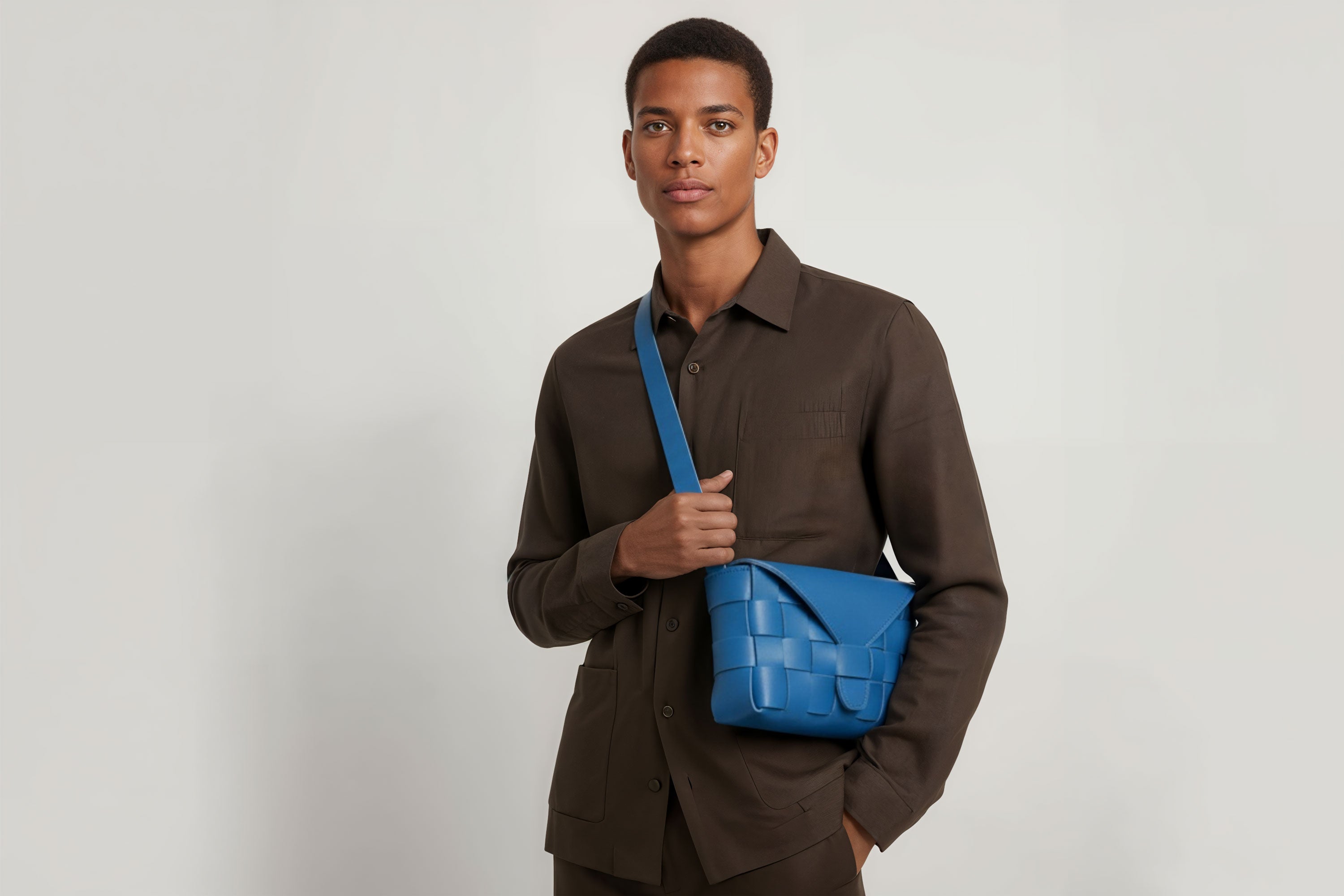 Leather Bag Royal Blue Color Big Saka On A Man Model Braided  Vegetable Tanned Leather Modern Minimalist Design Premium Quality Atelier Madre Manuel Dreesmann Barcelona Spain