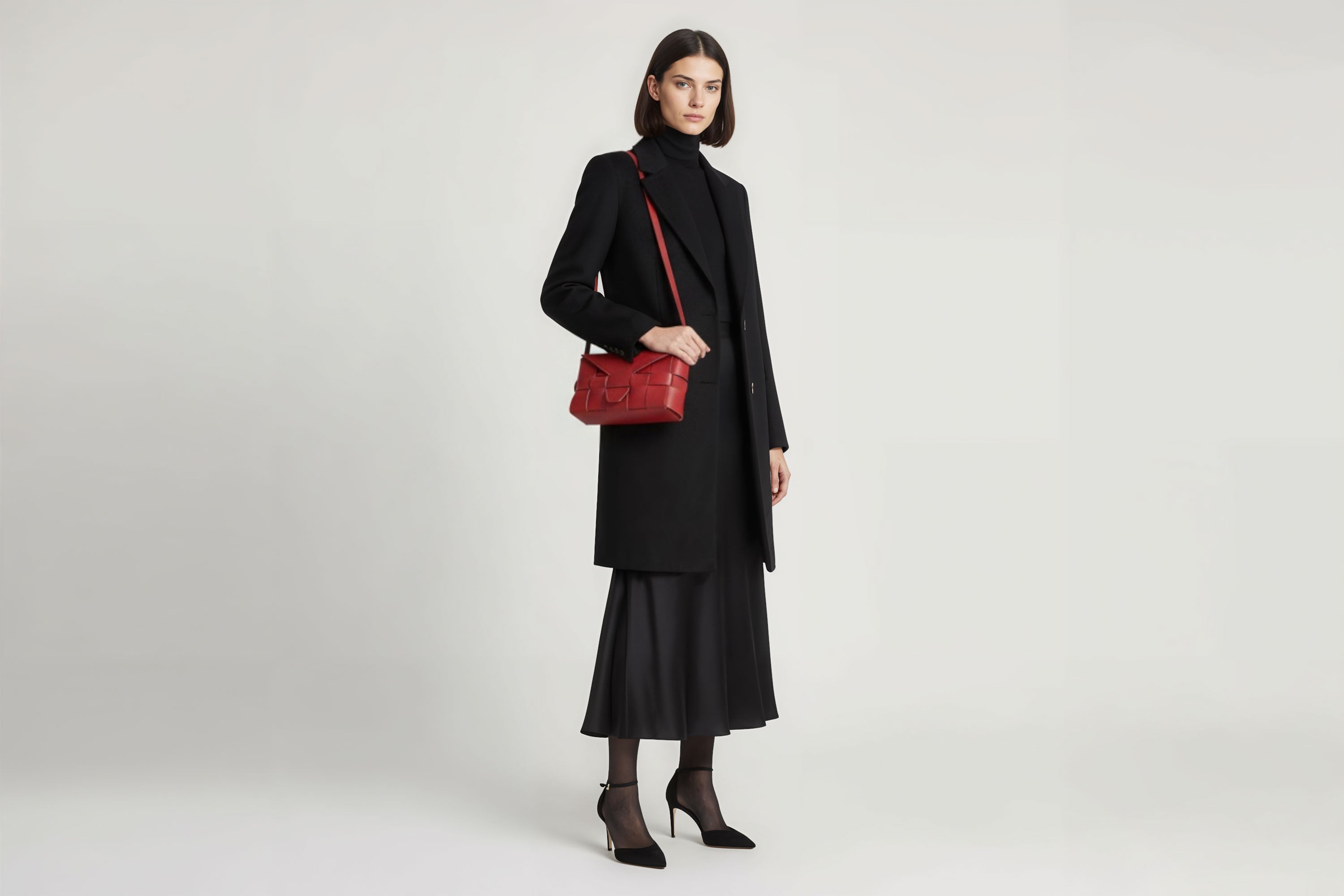 Woven Leather Bag Saka Bag Red Color Leather On Woman Model Bright Background Vegetable Tanned Leather Modern Minimalist Design Premium Quality Atelier Madre Manuel Dreesmann Barcelona Spain