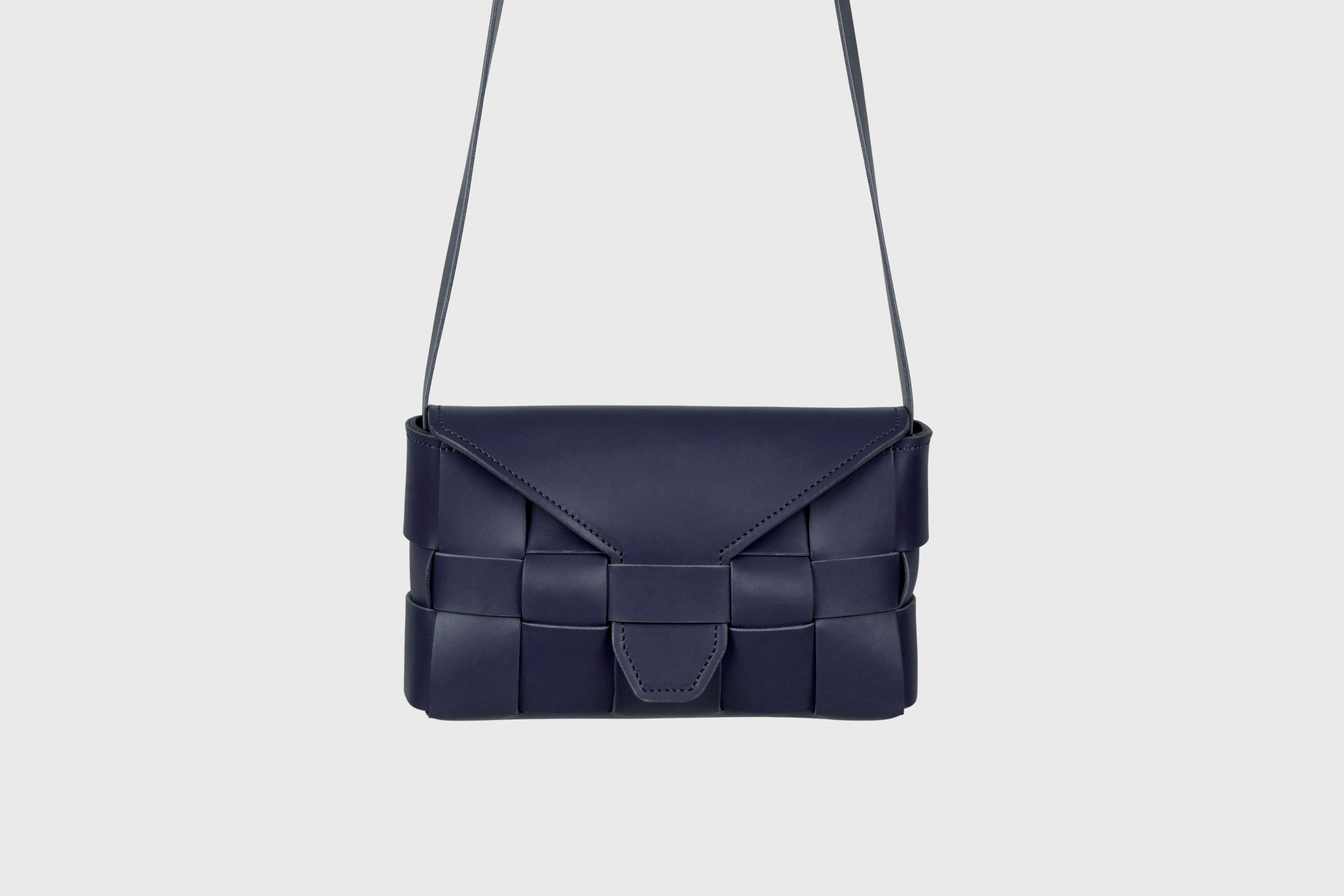 Saka Bag Regular In Marine Blue Color In Vegetable Tanned Full Grain Leather Woven Structure Design Atelier Madre Manuel Dreesmann Barcelona Spain