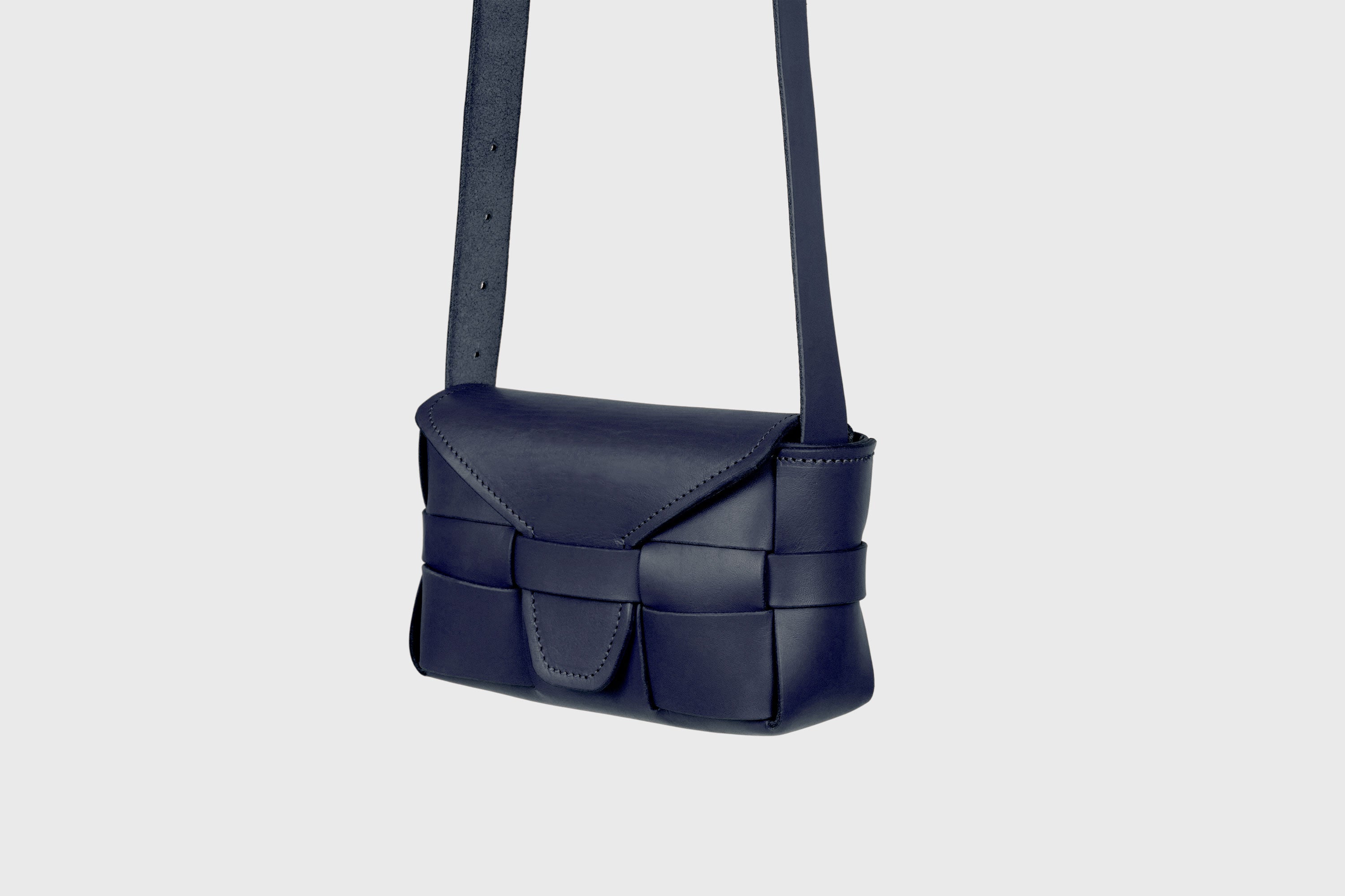 Saka Bag Small In Marine Blue Color In Vegetable Tanned Full Grain Leather Woven Structure Design Atelier Madre Manuel Dreesmann Barcelona Spain