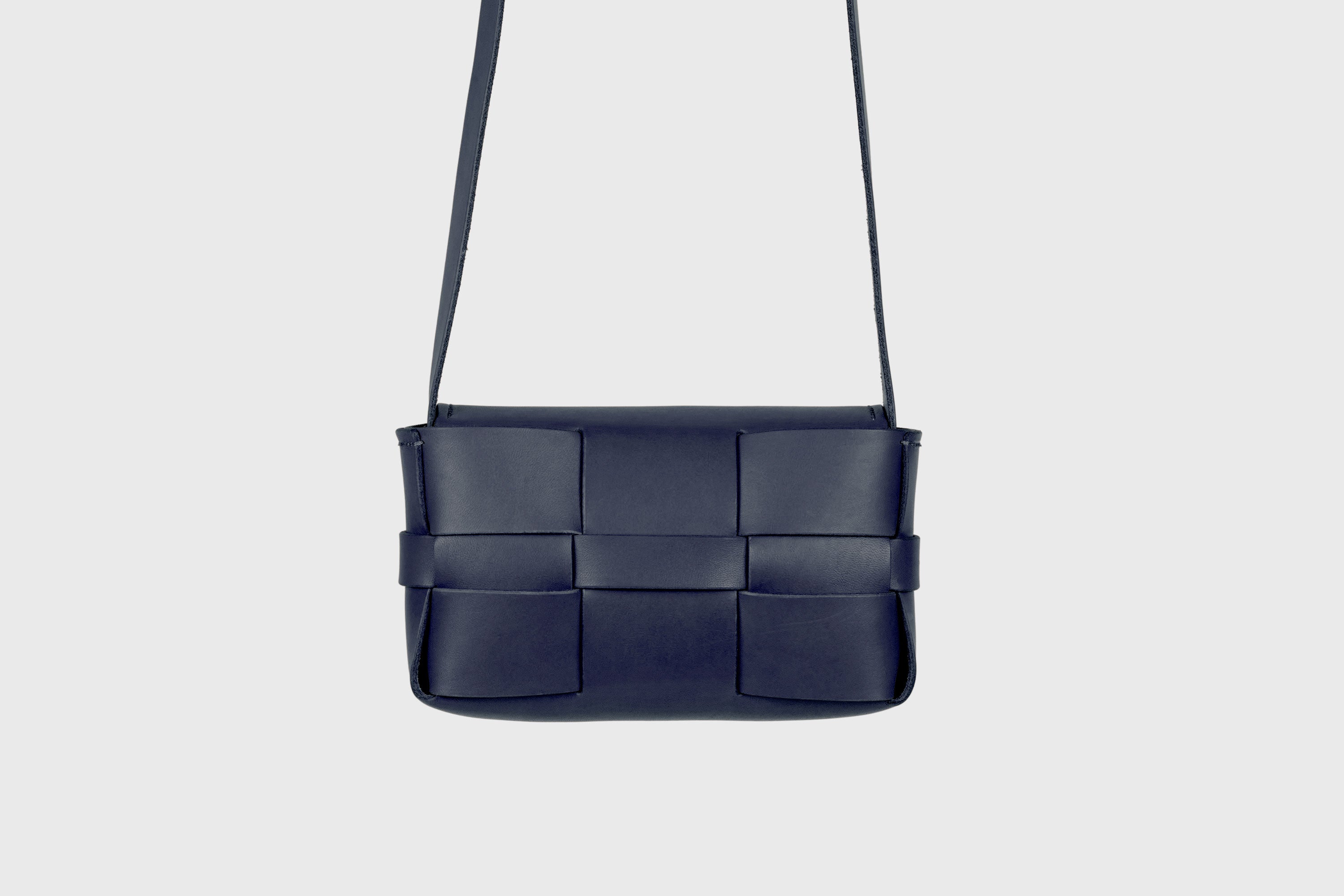 Saka Bag Small In Marine Blue Color In Vegetable Tanned Full Grain Leather Woven Structure Design Atelier Madre Manuel Dreesmann Barcelona Spain
