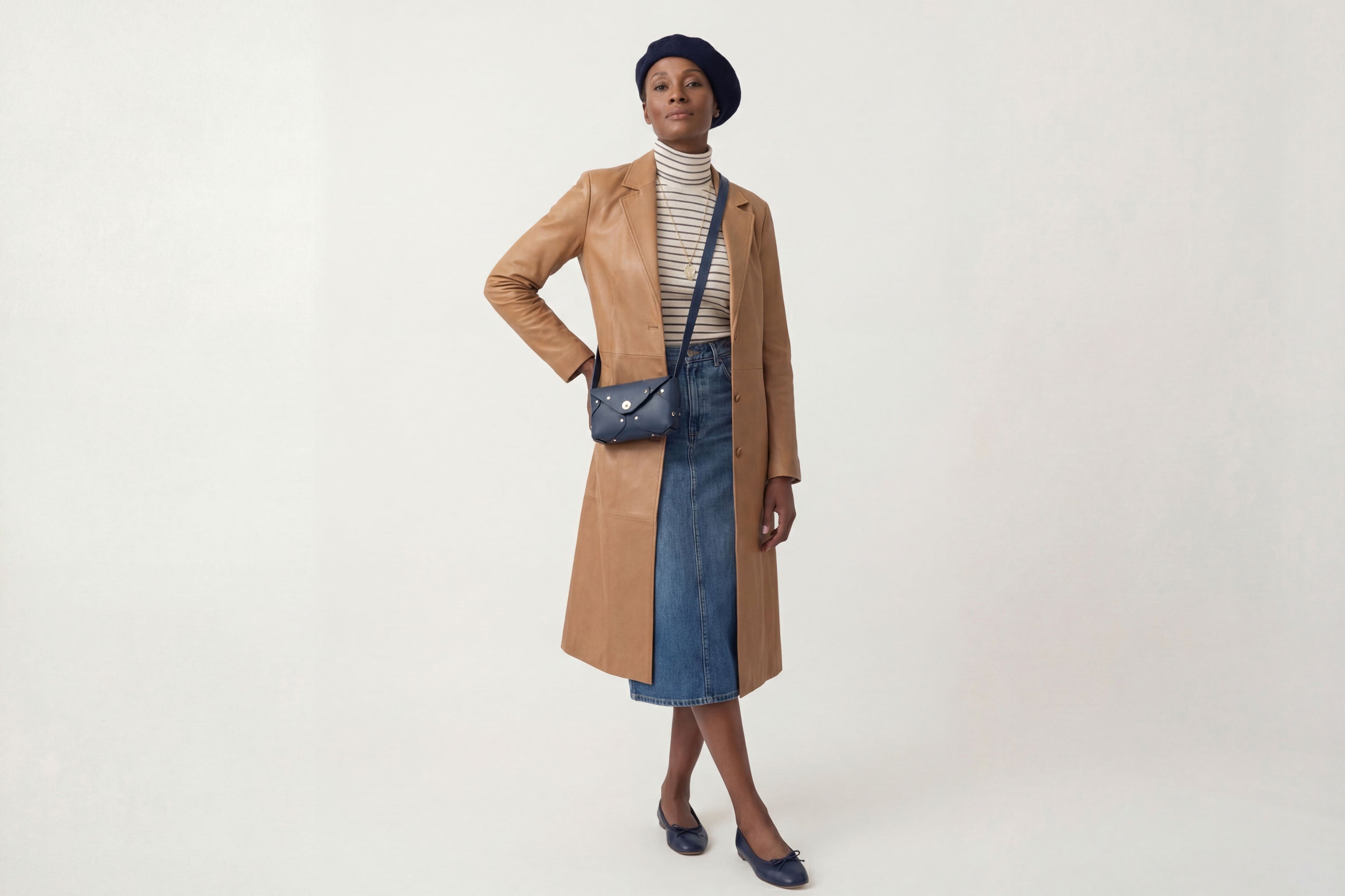 Tamara Bag Marine Blue Color On A Woman Model Leather Vegetable Tanned Leather Minimalist Modern Design Rivets Brass Premium Shoulderbag Atelier Madre Manuel Dreesmann Barcelona Spain