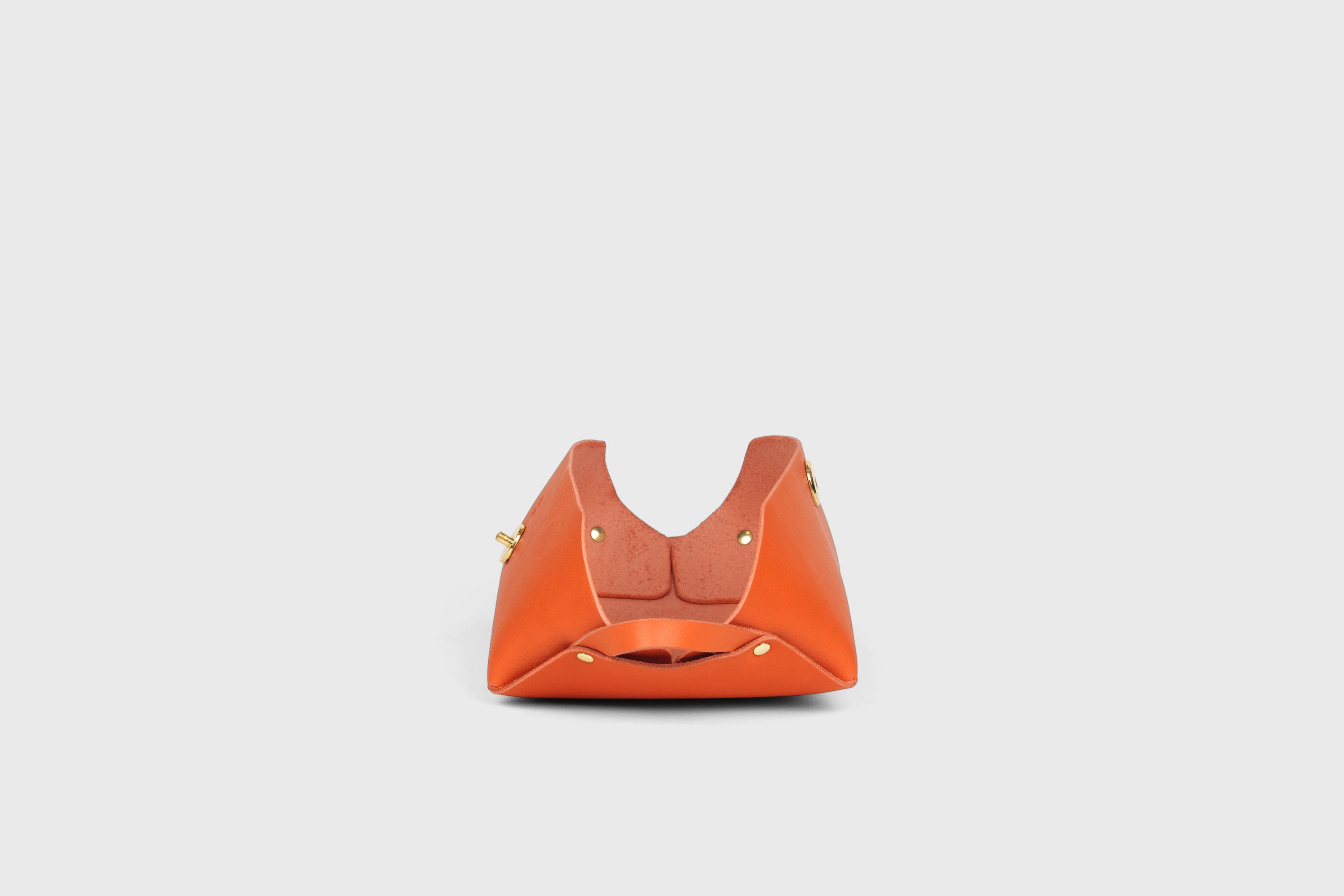 Cosmetic and Toiletry Bag Orange Color Leather Dopp Kit Mens Woman's Pouch Makeup Case Minimalistic Modern Design Atelier Madre Manuel Dreesmann Barcelona Spain