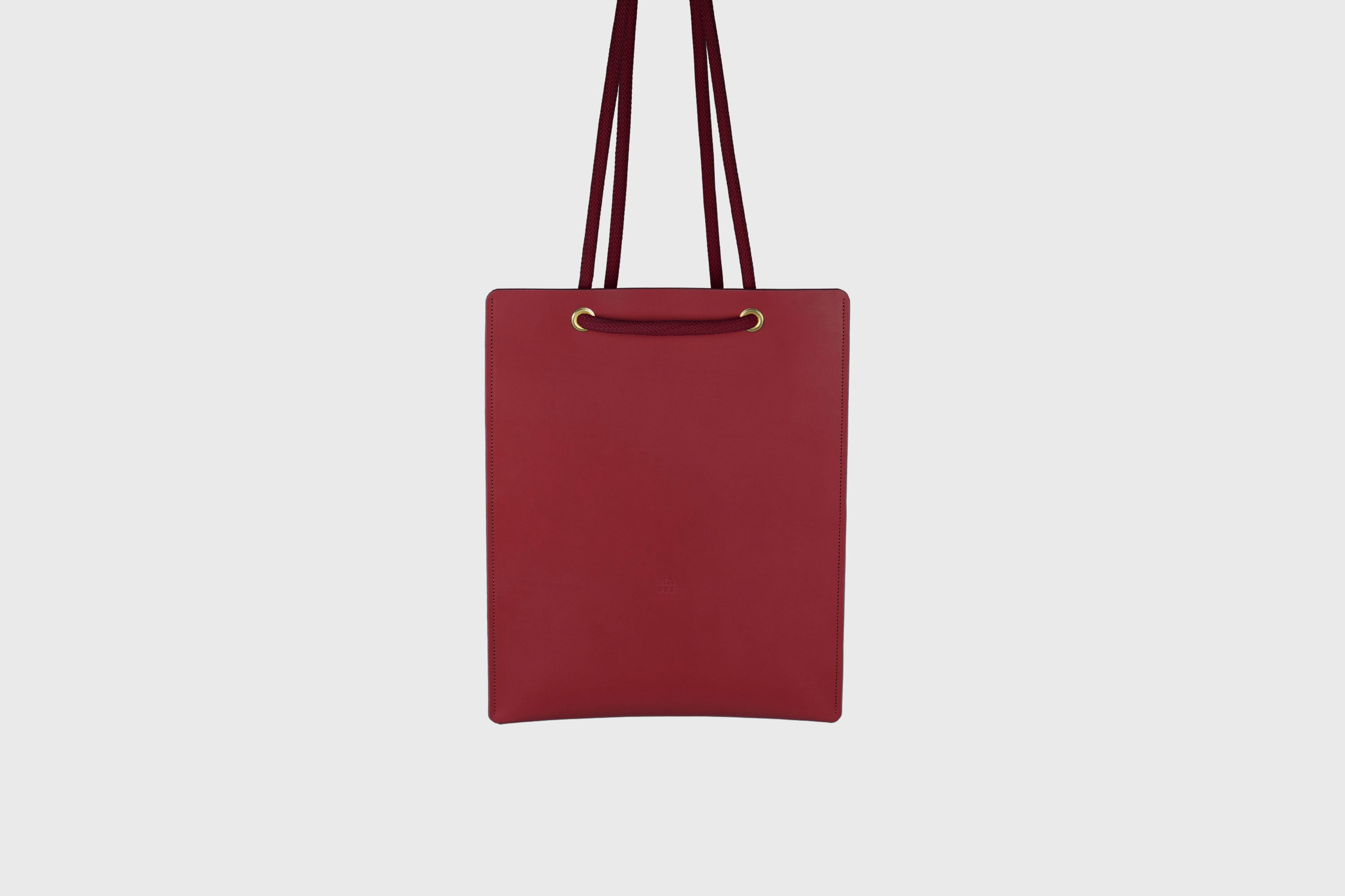Tote Backpack Premium Leather Red Color Rope Handles Minimalist Design Atelier Madre Manuel Dreesmann Barcelona Spain