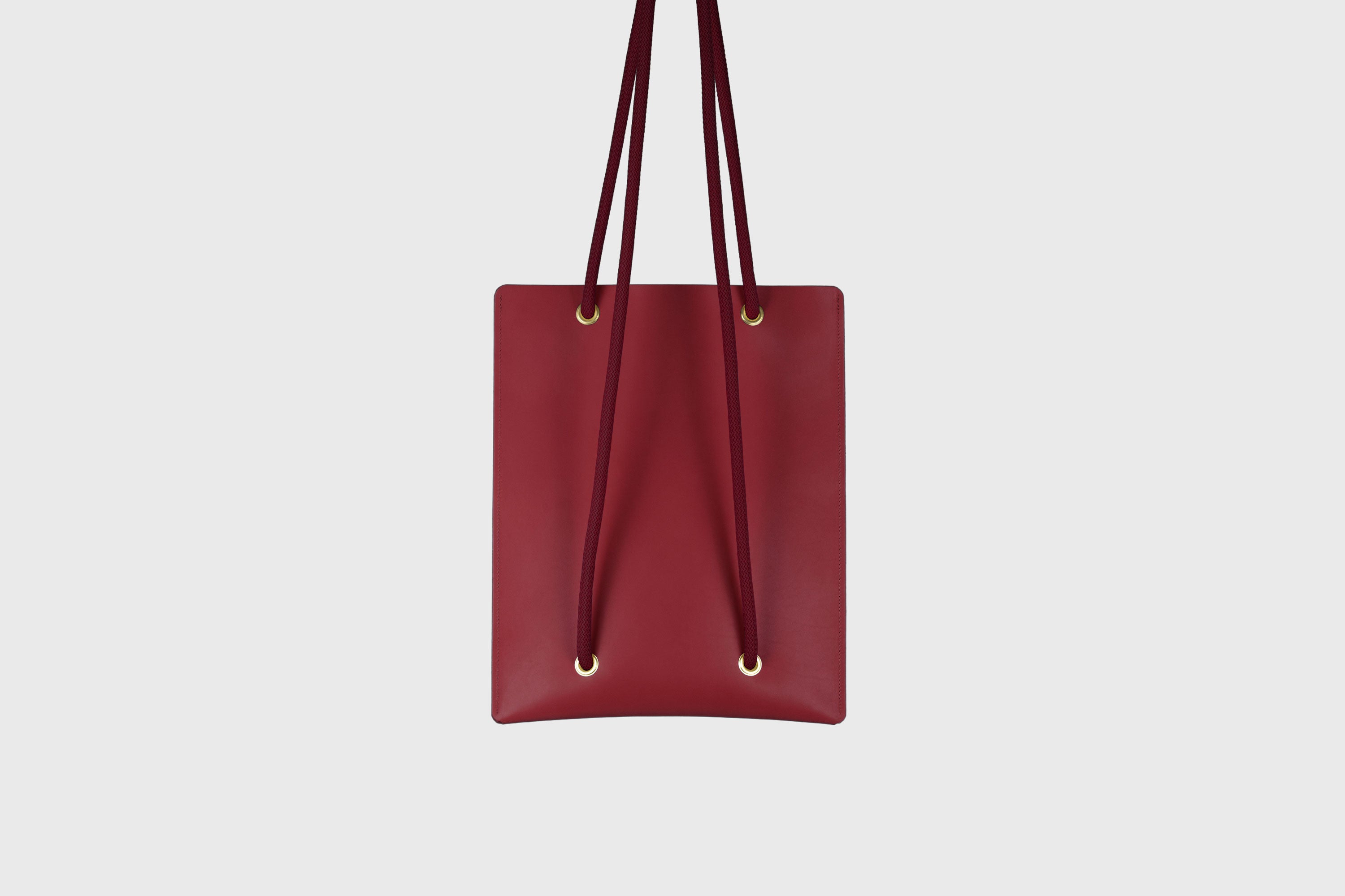 Tote Backpack Premium Leather Red Color Rope Handles Minimalist Design Atelier Madre Manuel Dreesmann Barcelona Spain
