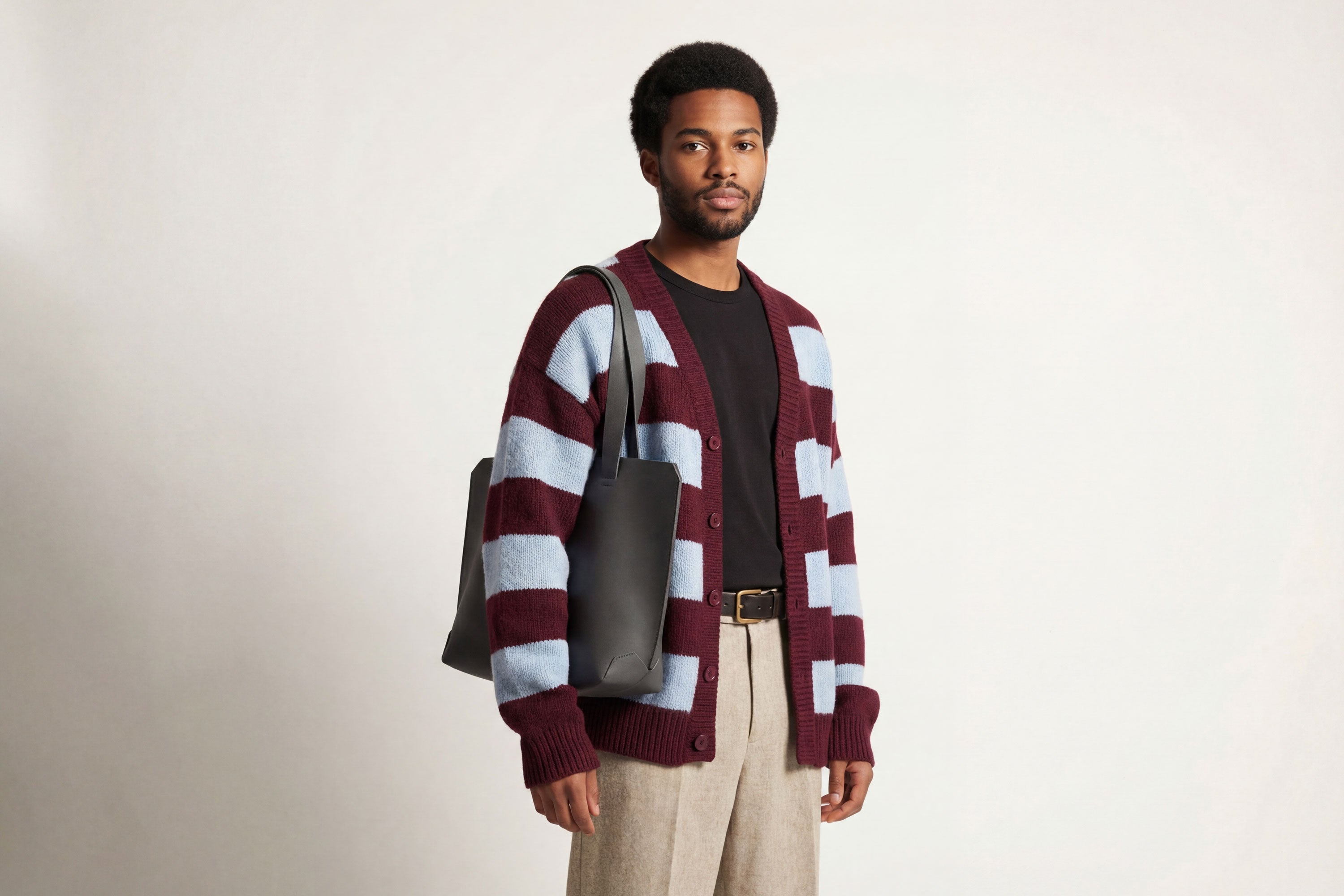 Tote Bag Leather Black Color On a Man Model Vegetable Tanned Leather Natural Minimalistic Design By Manuel Dreesmann Atelier Madre Barcelona Spain