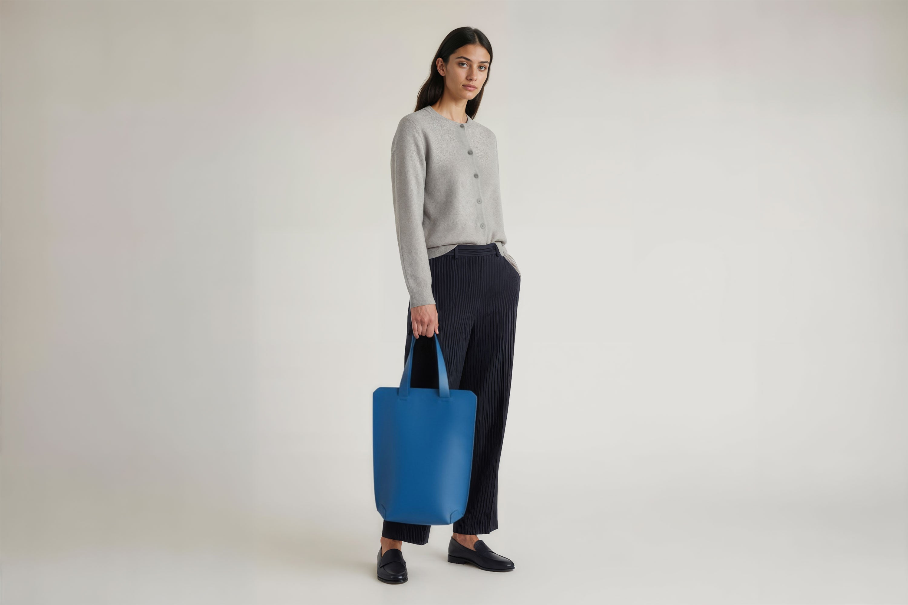 Tote Bag Long Royal Blue Leather Bag On A Woman Model Vegetable Tanned Leather Exclusive Quality Craftsmanship Handmade Design By Manuel Dreesmann Atelier Madre Barcelona Spain