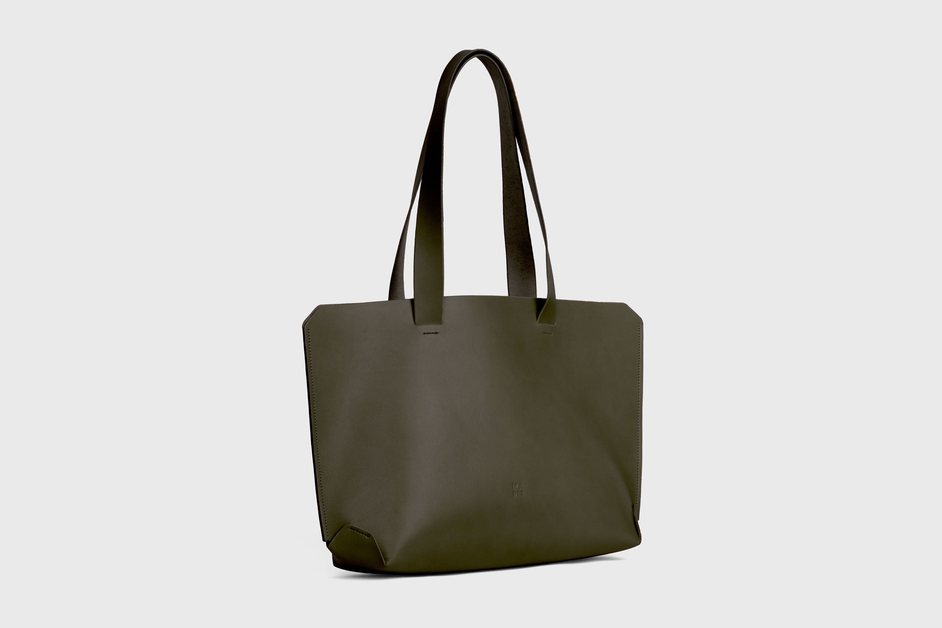 Tote H Bag In Olive Green Color In Vegetable Tanned Leather Minimalistic Design Open Top Atelier Madre Manuel Dreesmann Barcelona Spain