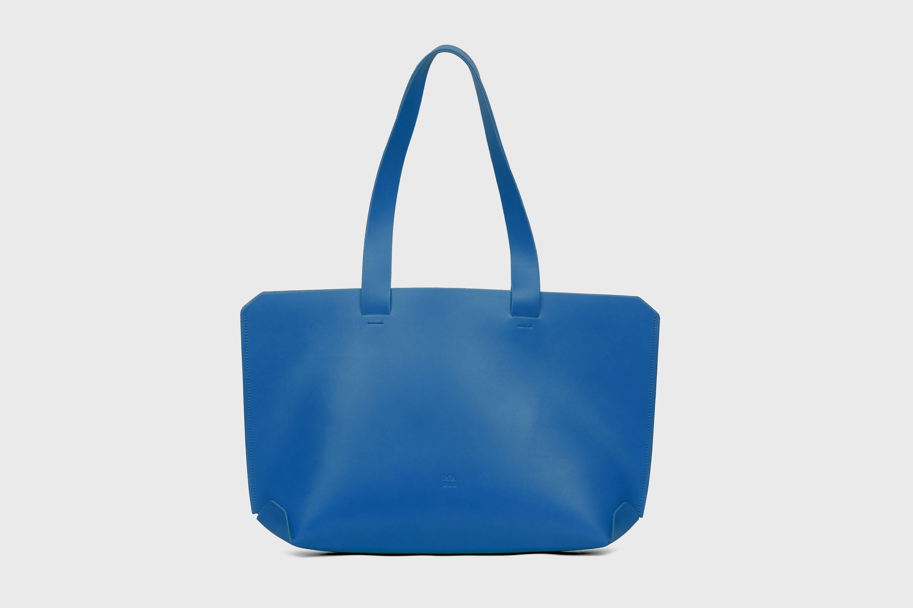 Tote H Bag In Royal Blue Color In Vegetable Tanned Leather Minimalistic Design Open Top Atelier Madre Manuel Dreesmann Barcelona Spain