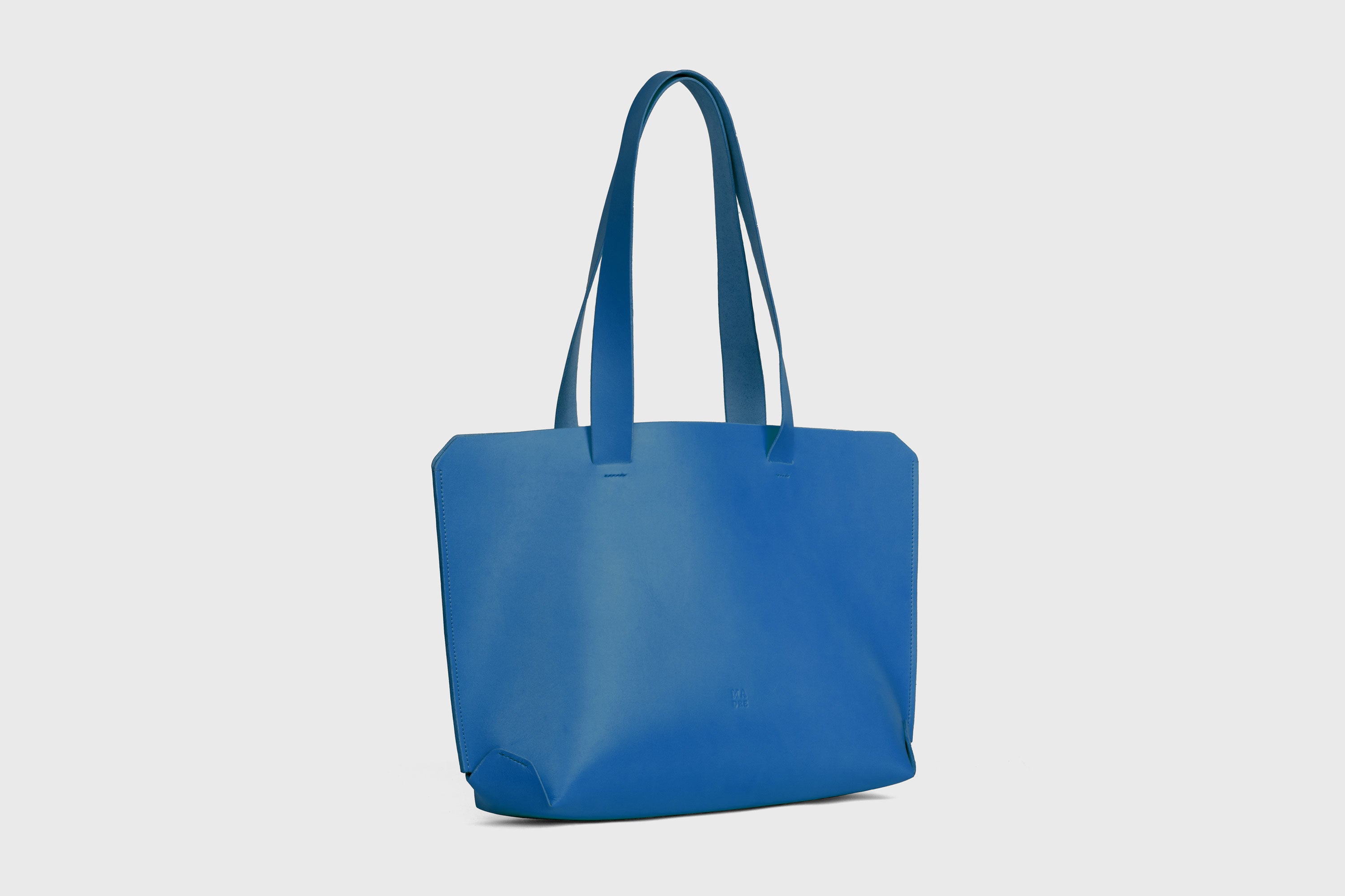 Tote H Bag In Royal Blue Color In Vegetable Tanned Leather Minimalistic Design Open Top Atelier Madre Manuel Dreesmann Barcelona Spain